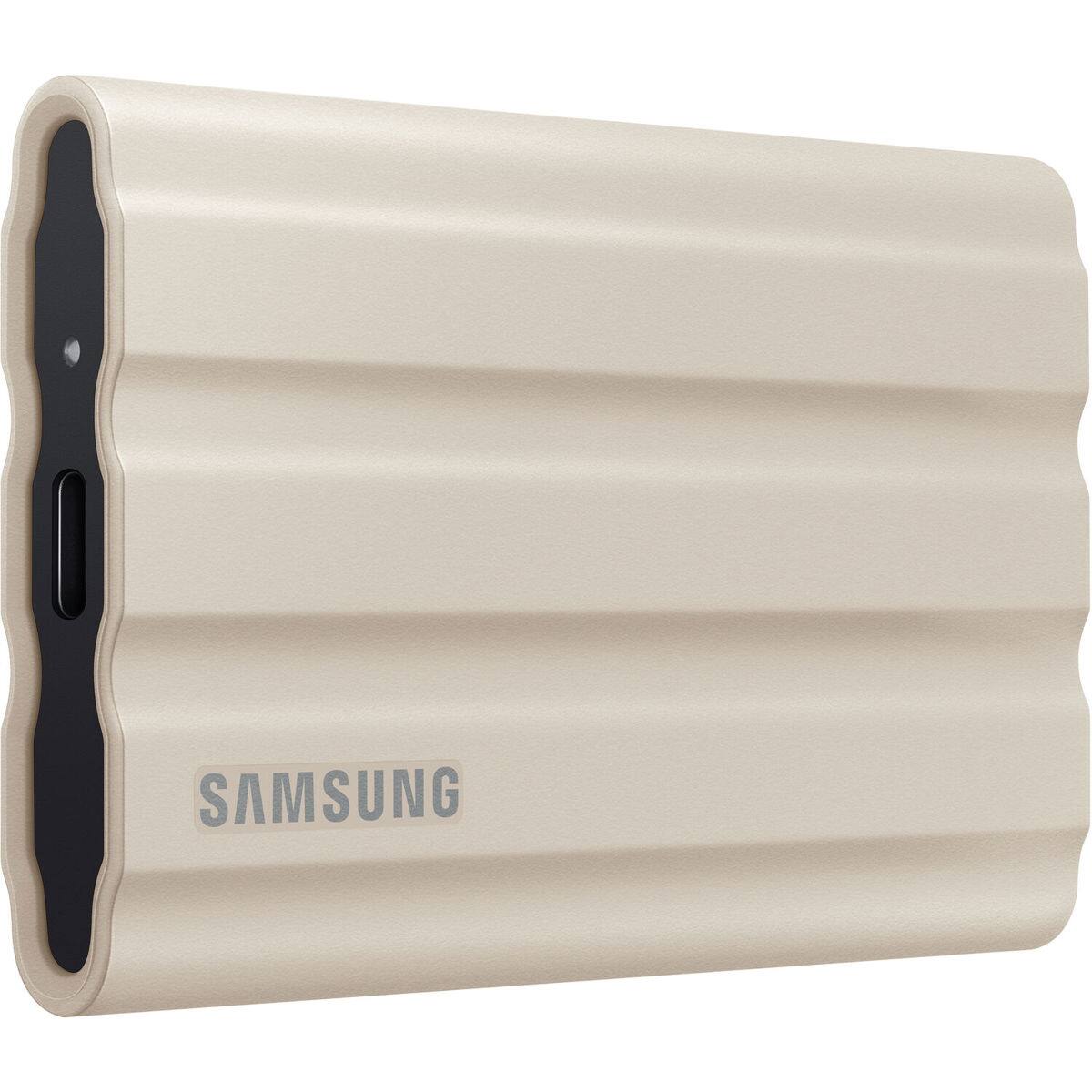 Alt View 1. Samsung - Samsung T7 Shield 1TB USB 3.2 Gen 2 Type-C Portable External SSD, Beige, with HD-2 Drive Case.
