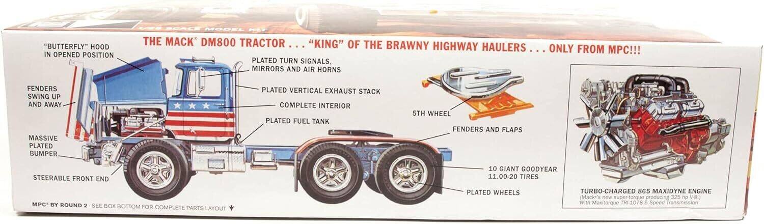 "BUTTERFLY" HOOD IN OPENED POSITION SCACE MODEL NET THE AC" DM800 TRACTOR "KING" OF THE BRAWNY ... HIGHWAY HAULERS... ONLY FROM MPC!!! PLATED TURN SIGNALS, MIRRORS AND AIR HORNS FENDERS SWING UP AND AWAY MASSIVE PLATED BUMPER PLATED VERTICAL EXHAUST STACK COMPLETE INTERIOR PLATED FUEL TANK 5TH WHEEL FENDERS AND FLAPS STEERABLE FRONT END 10 GIANT GOODYEAR 11.00-20 TIRES MPC BY ROUND 2 SEE BOX BOTTOM FOR COMPLETE PARTS LAYOUT PLATED WHEELS TURBO-CHARGED 865 MAXIDYNE ENGINE (Mack's new super-torque producing 325 hp V.8.) With Maxitorque TRI-1078 5 Speed Transmission