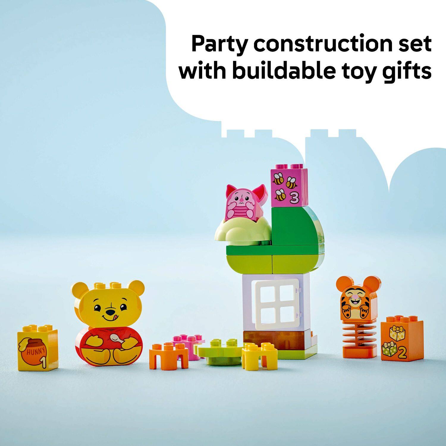 Party construction set with buildable toy gifts.