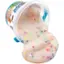 A Yoplait brand yogurt cup is filled with a creamy, colorful substance that resembles a dessert.