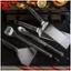 The image features a variety of kitchen utensils, including a spatula, tongs, and a spoon. The spatula is placed on the left side of the image, while the tongs are positioned in the middle. The spoon is located on the right side of the image. The utensils are arranged in a way that showcases their different shapes and sizes.