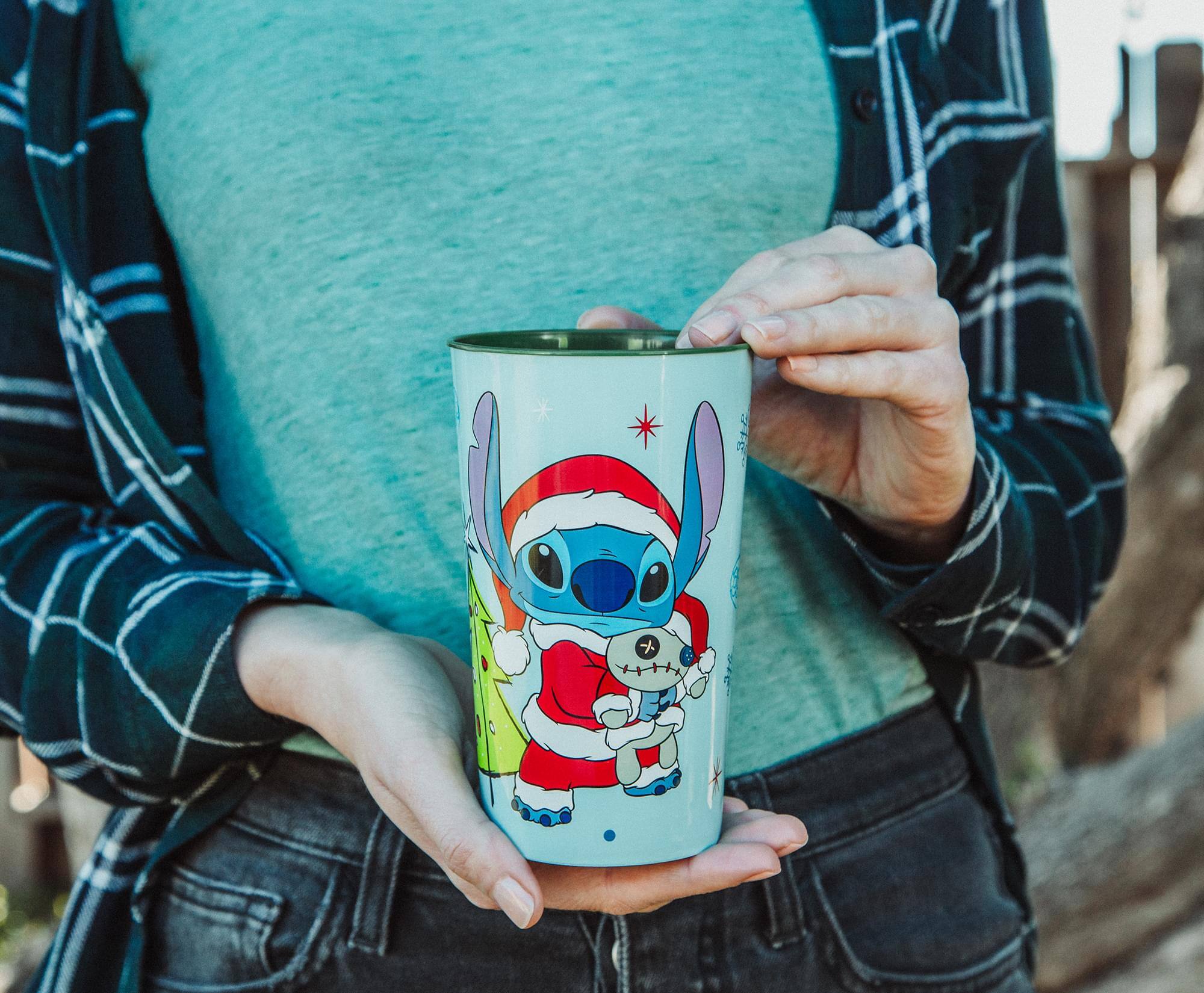 Alt View 2. Silver Buffalo - Disney Lilo & Stitch Santa Stitch 4-Piece Plastic Cup Set | Each Holds 22 Ounces - Blue.