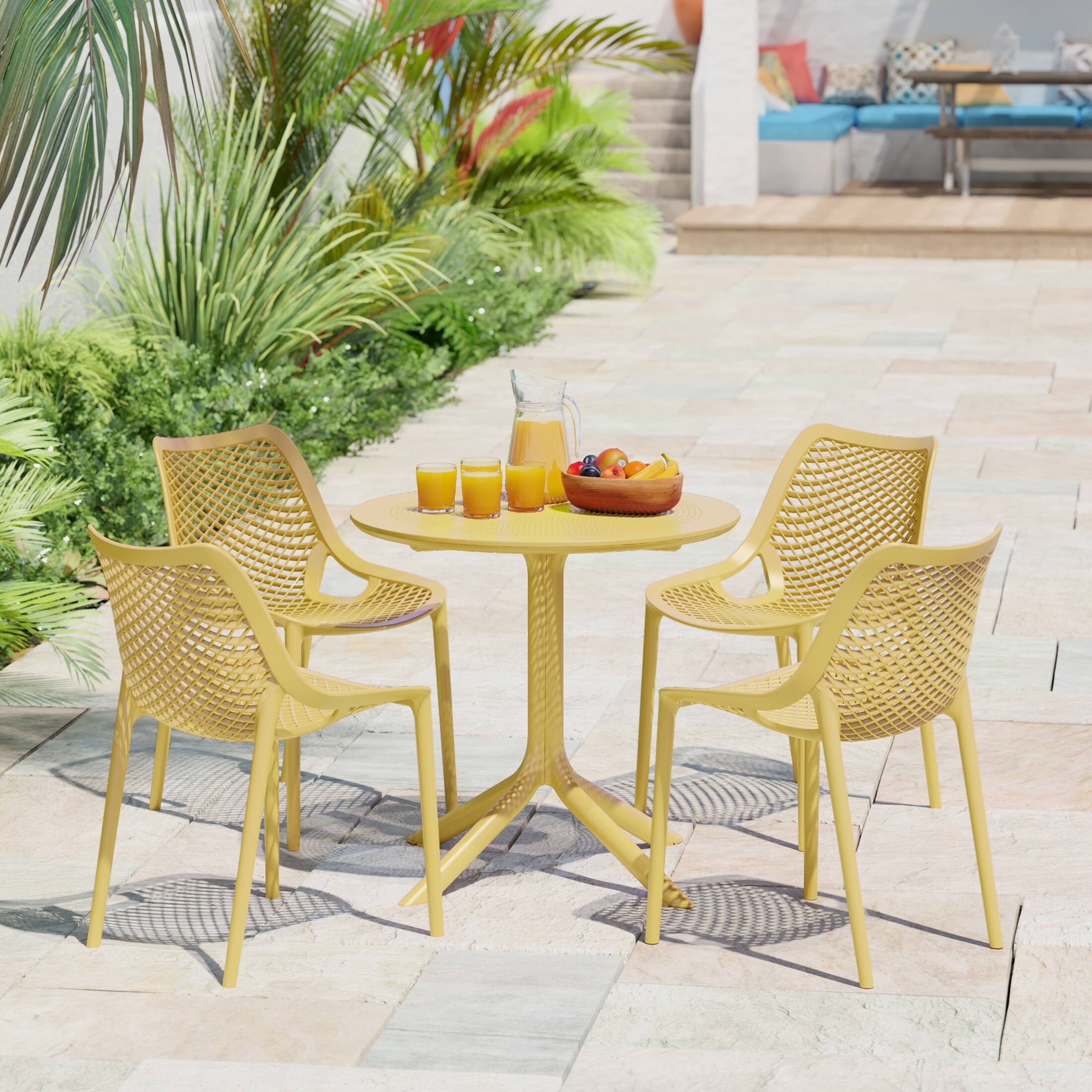 Angle. WestinTrends - WestinTrends Playa 31.5" Round Plastic Outdoor Patio Dining Table for 4 - Yellow.