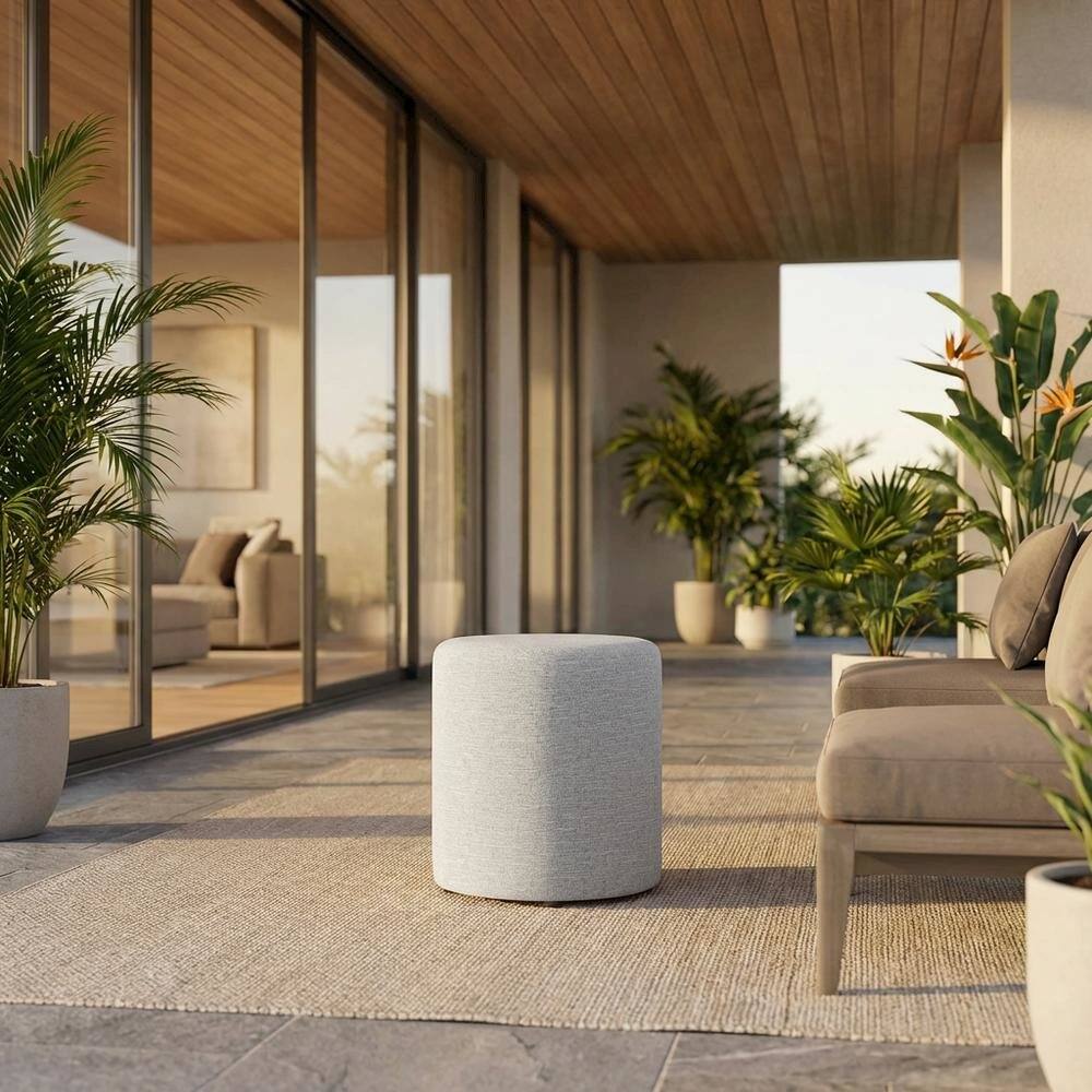 Angle. Outdoor Escape - 16" Round Heathered Fabric Upholstered Ottoman for Outdoor Living - Gray.