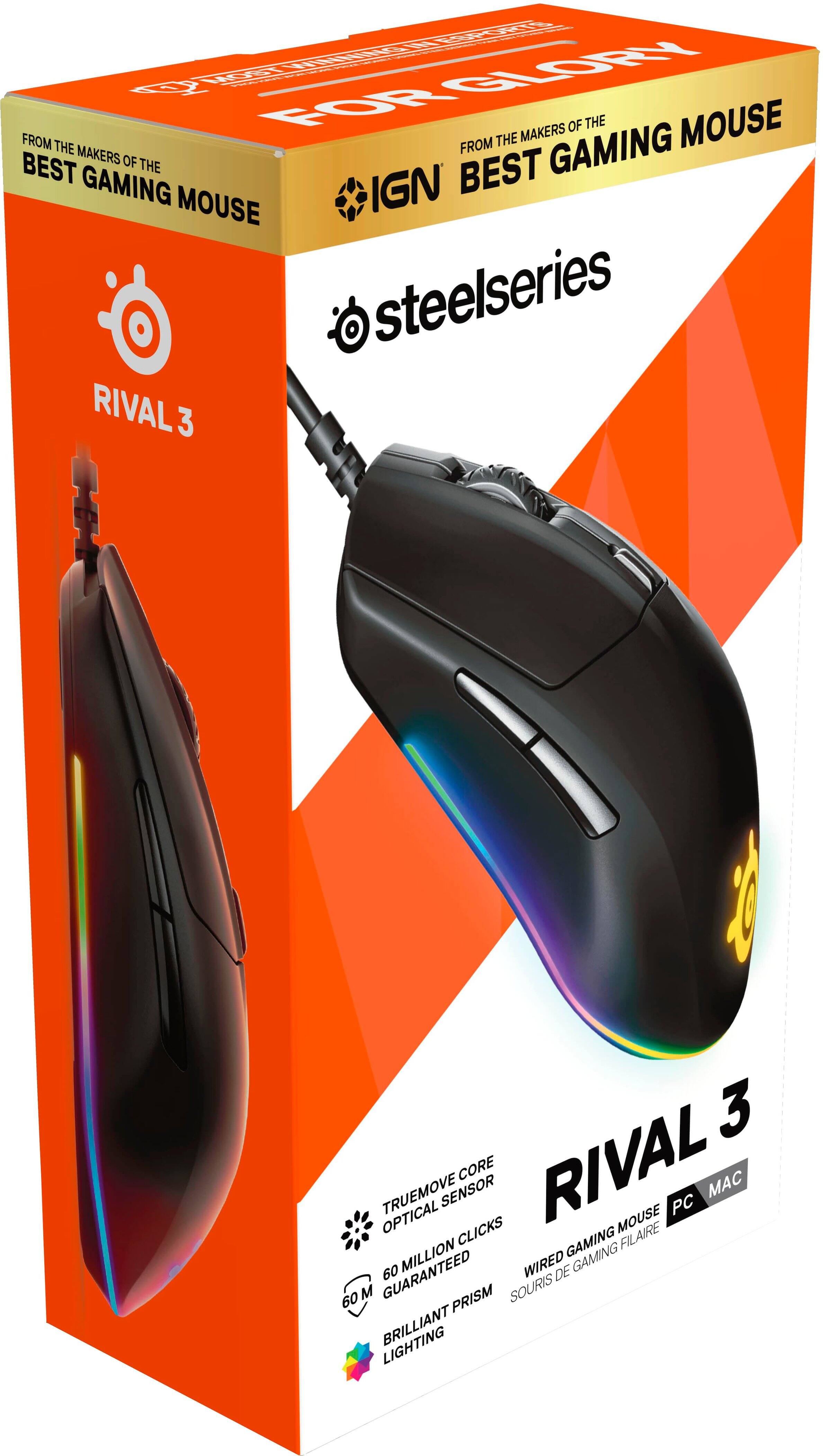 The text on the image reads: "ea GORt FIOM FOR IN MANEO - MOUSE THE WINGRS FROM GAMING BEST THE GAMING IGN BEST MOUSE steelseries RIVAL3 3 OPTICAL PRUEMOVE BENTOR Sam RIVAL MNE PC MAC A NT FLare M OT cM QUARANTEEO ~ -e - n A - ScN2E BALLIANT PROM LAERTINE."
