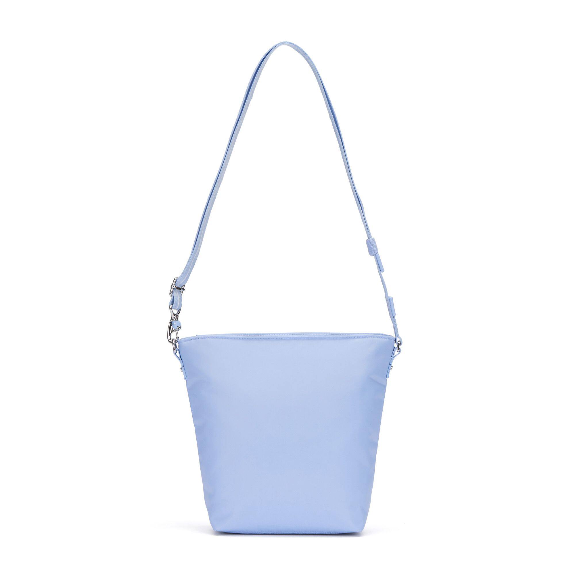 Left. Pacsafe - W Crossbody - Serenity Blue.