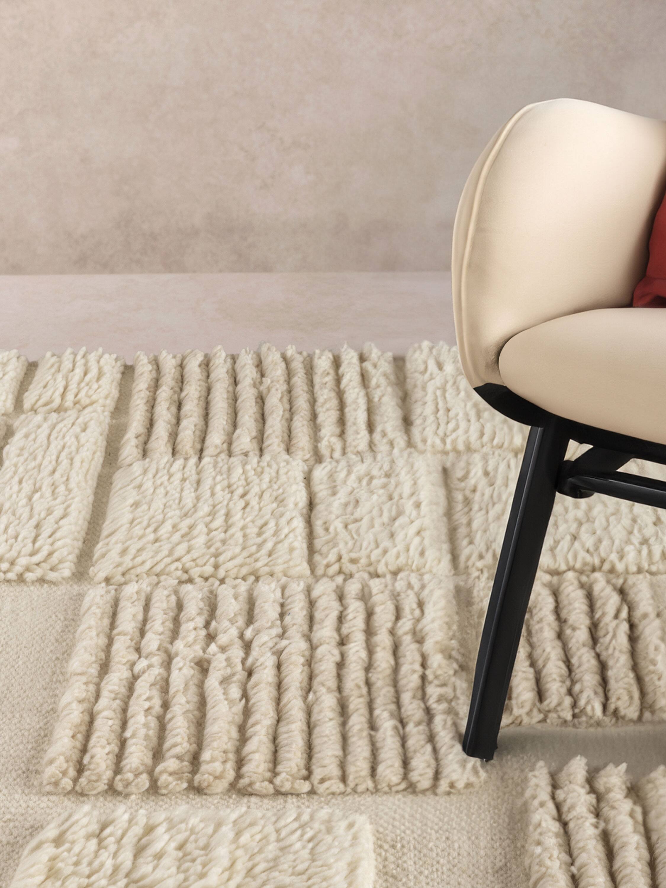 Angle. GAURI KOHLI - Winnipeg Rug - Shades of ivory, beige and taupe.