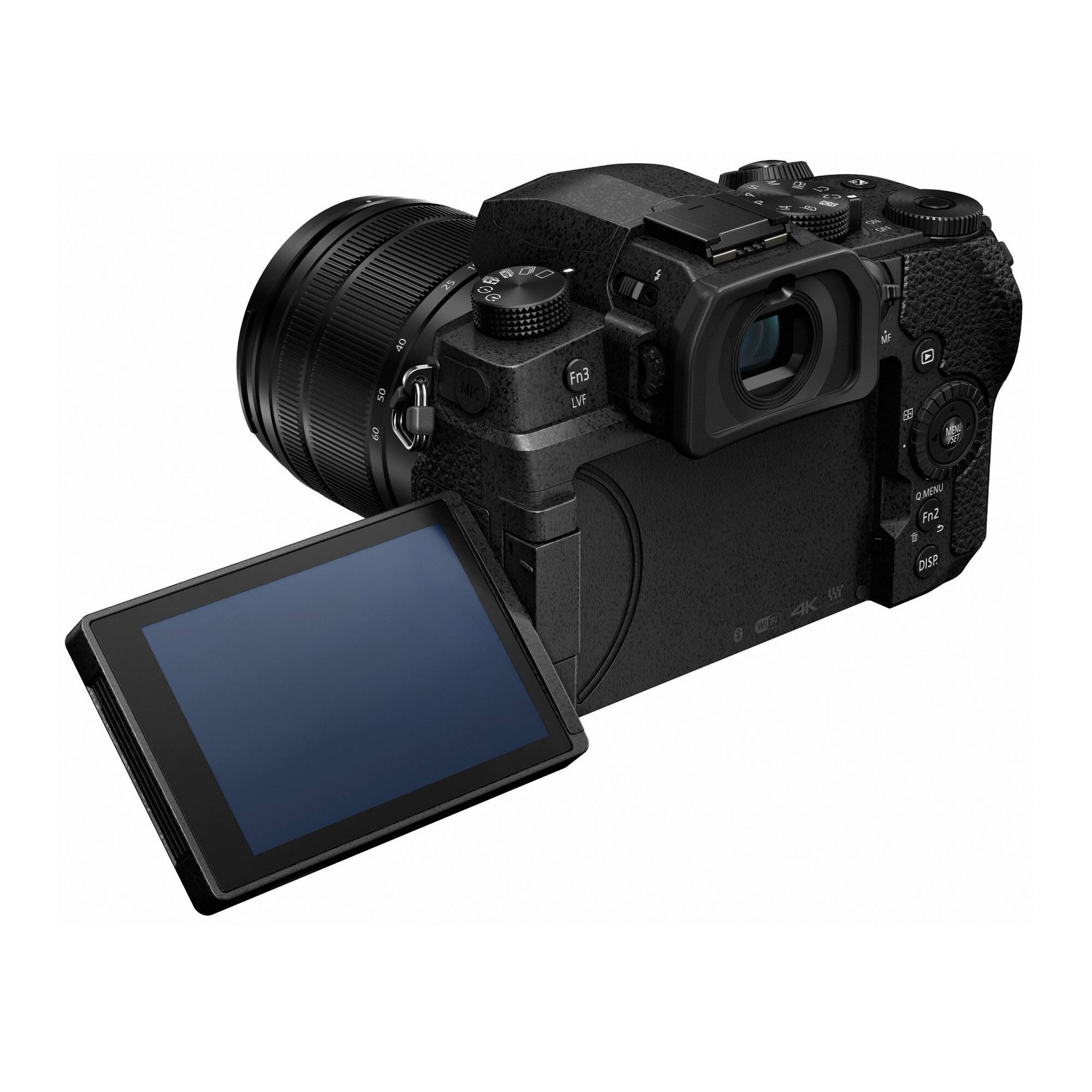 The image features a camera with a lens attached to it, sitting next to a small screen. The camera is a Canon EOS 5D Mark III, and the lens is a 24-70mm lens. The small screen is likely a smartphone or tablet, which is connected to the camera. The camera is placed on a white background, making it the main focus of the image.