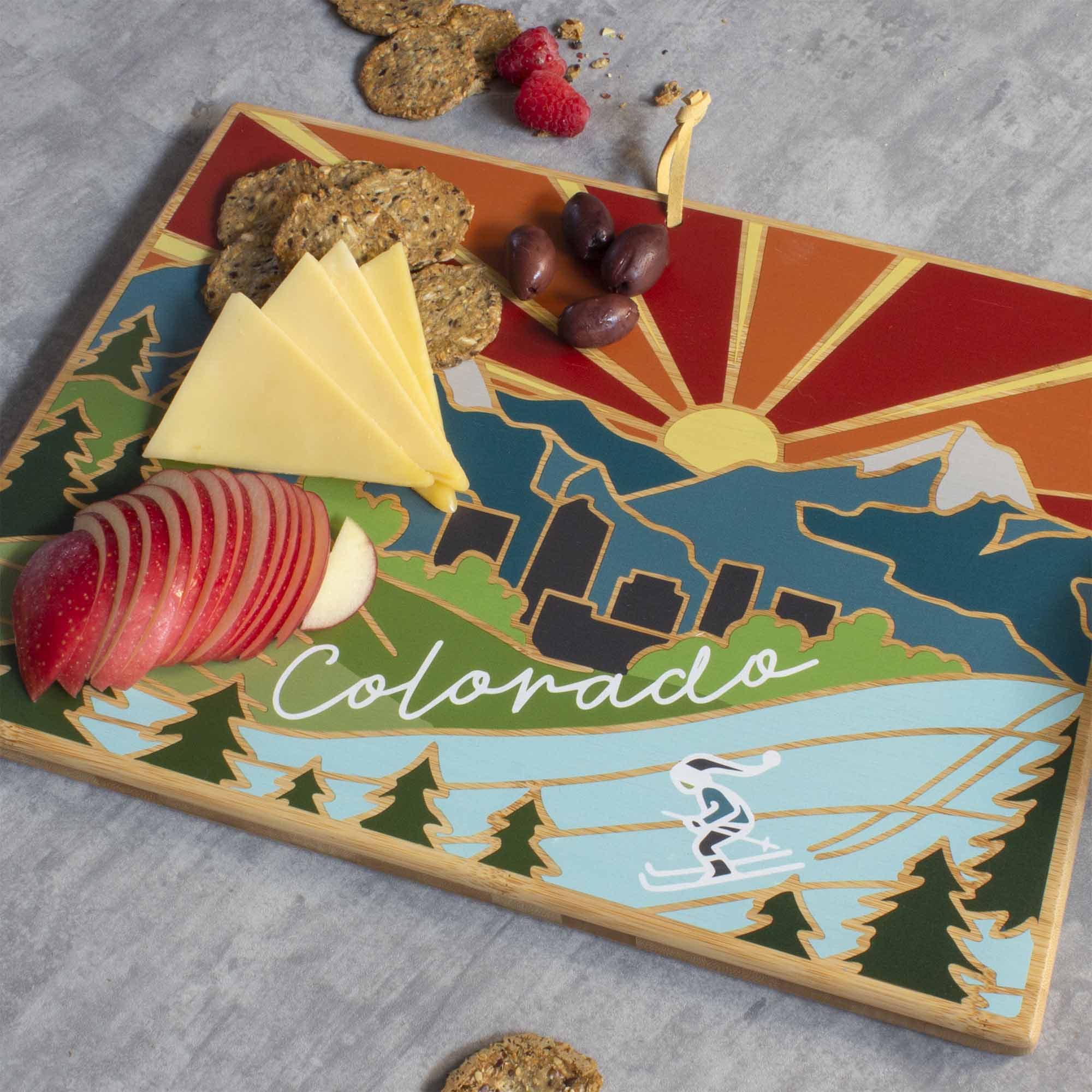 Left. Totally Bamboo - Colorado Cutting Board with Artwork by Summer Stokes.