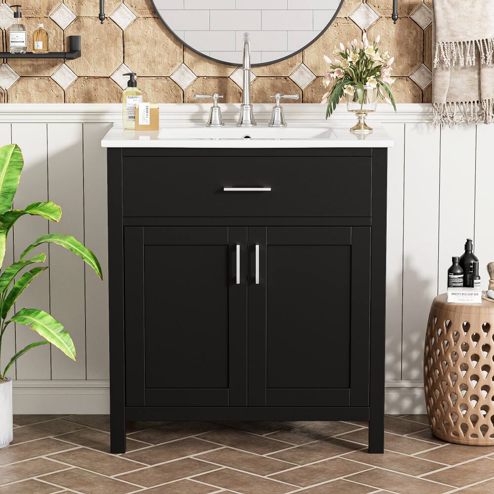 Left. JUJABU - Black 30-Inch Bathroom Vanity with Ceramic Sink and Ample Storage - The Perfect Choice for Small Bathrooms - Black.