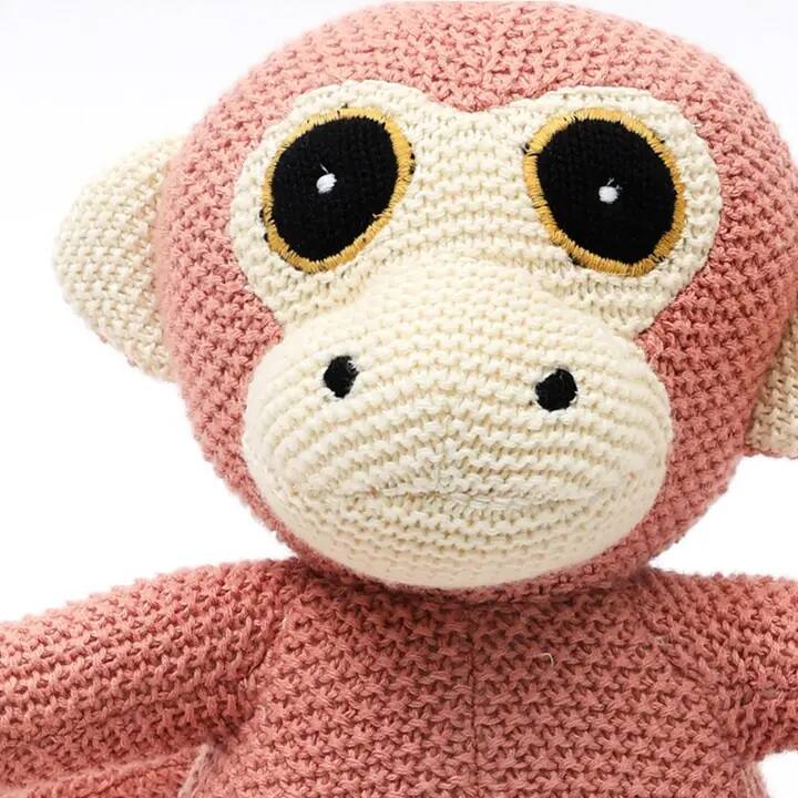 Angle. Siljoy - Knitted Stuffed Monkey Soft Toy, 22x26cm, Coral Almond, 100% Cotton & Polyester, Safe & Snuggly - Coral.