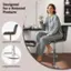 Designed for a Relaxed Posture: The chair is designed to provide comfort and support for a relaxed posture, allowing the woman to sit with her legs crossed and her feet up on the footrest.

Supportive Backrest: The chair features a backrest that supports the woman's back, ensuring that she can sit comfortably and maintain a relaxed posture.

Integrated Footrest: The chair has an integrated footrest, which allows the woman to rest her feet while sitting and provides additional support and comfort.