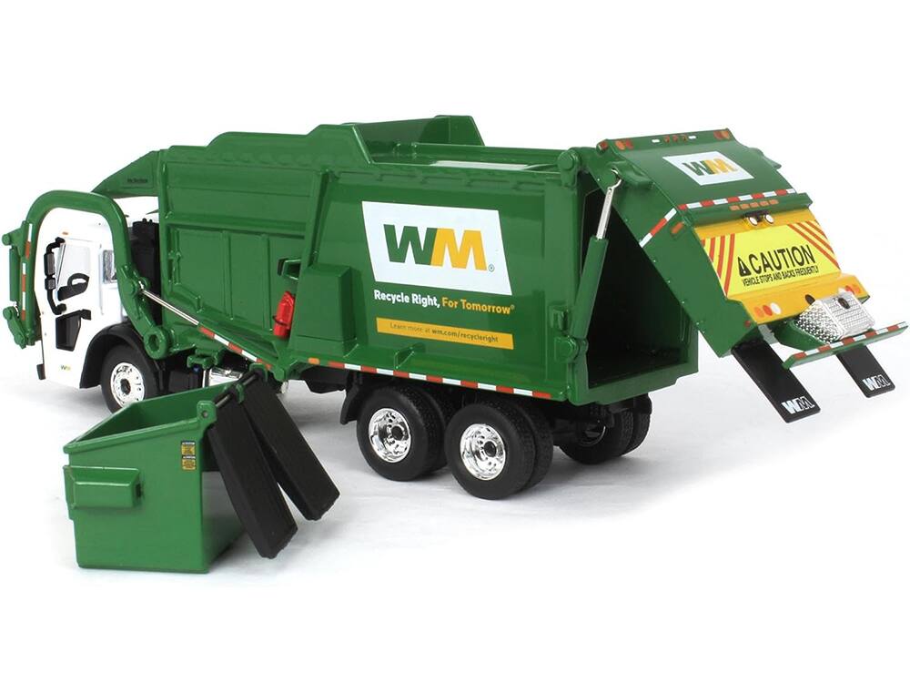 WM  
WM Recycle Right, For Tomorrow  
Learn more at wm.com/recycleright  
CAUTION BACKS FREQUENTLY STOPS AND VEHICLE  
WAN  
WORLD