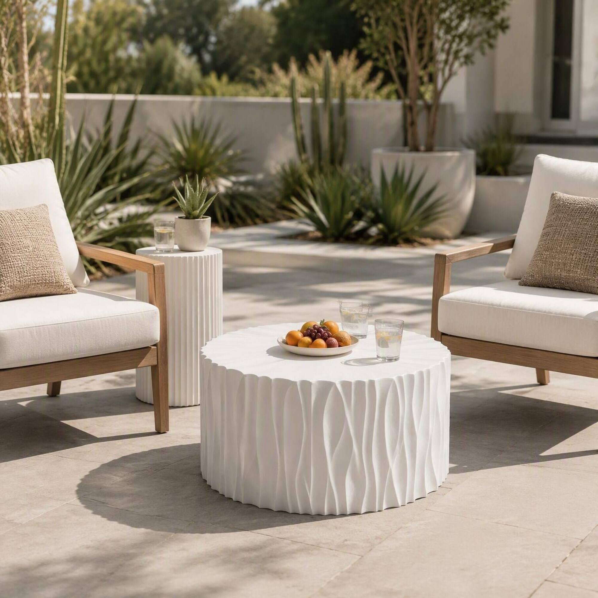 Left. RYHNUYNE - Modern White Round Outdoor Coffee Table 26.77"with Wavy Fluted Sides,Ready to Use for Patio Garden Balcony - White.