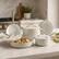Angle. Alva - Alva Mobi Ceramic Nonstick 8-Piece Cookware Set - Cannoli Cream.
