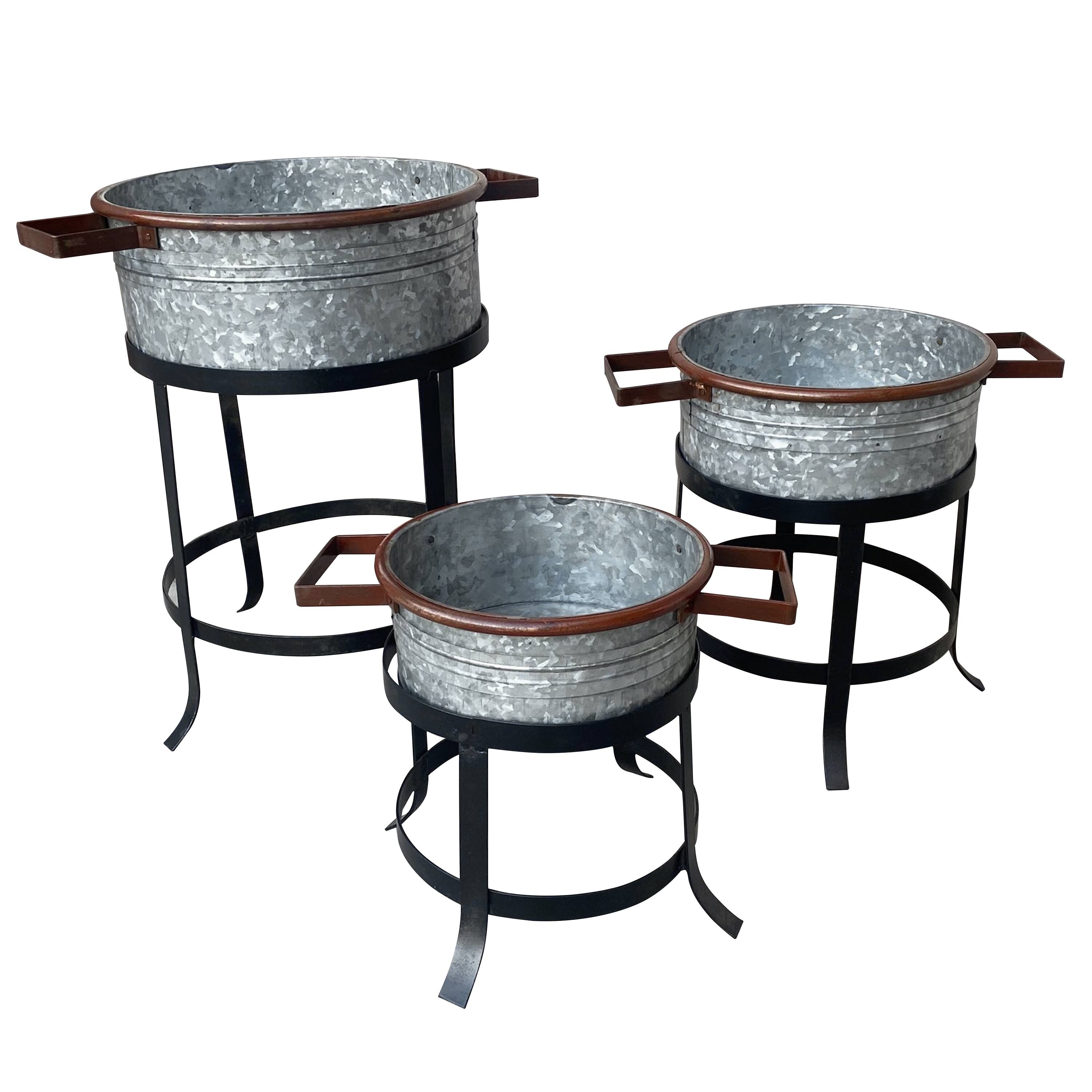 Angle. Manhattan Lane - 21, 18, and 16 Inch 3 Piece Round Tub Metal Planter Set with Stand in Galvanized Gray and Black Iron - Gray and Black.