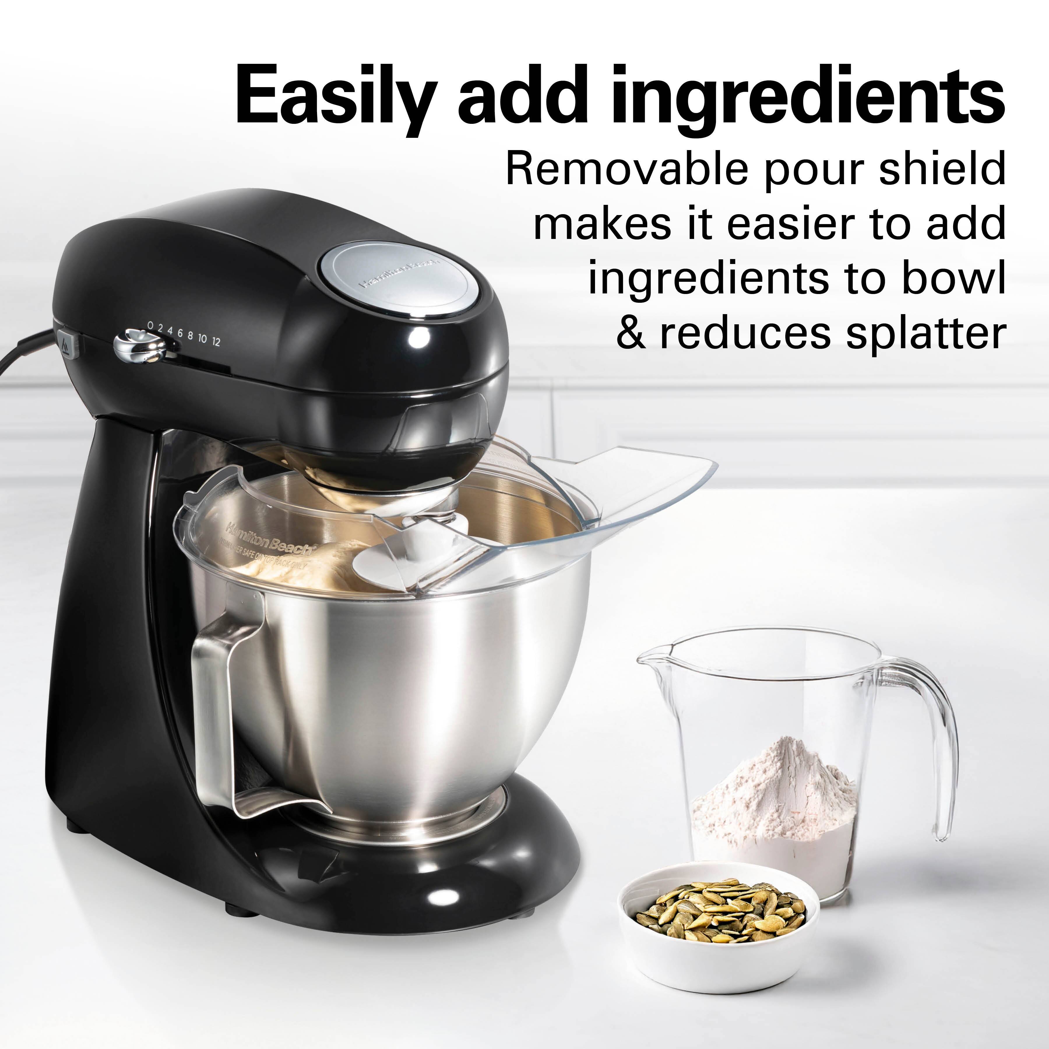 Easily add ingredients  
Removable pour shield makes it easier to add ingredients to bowl & reduces splatter