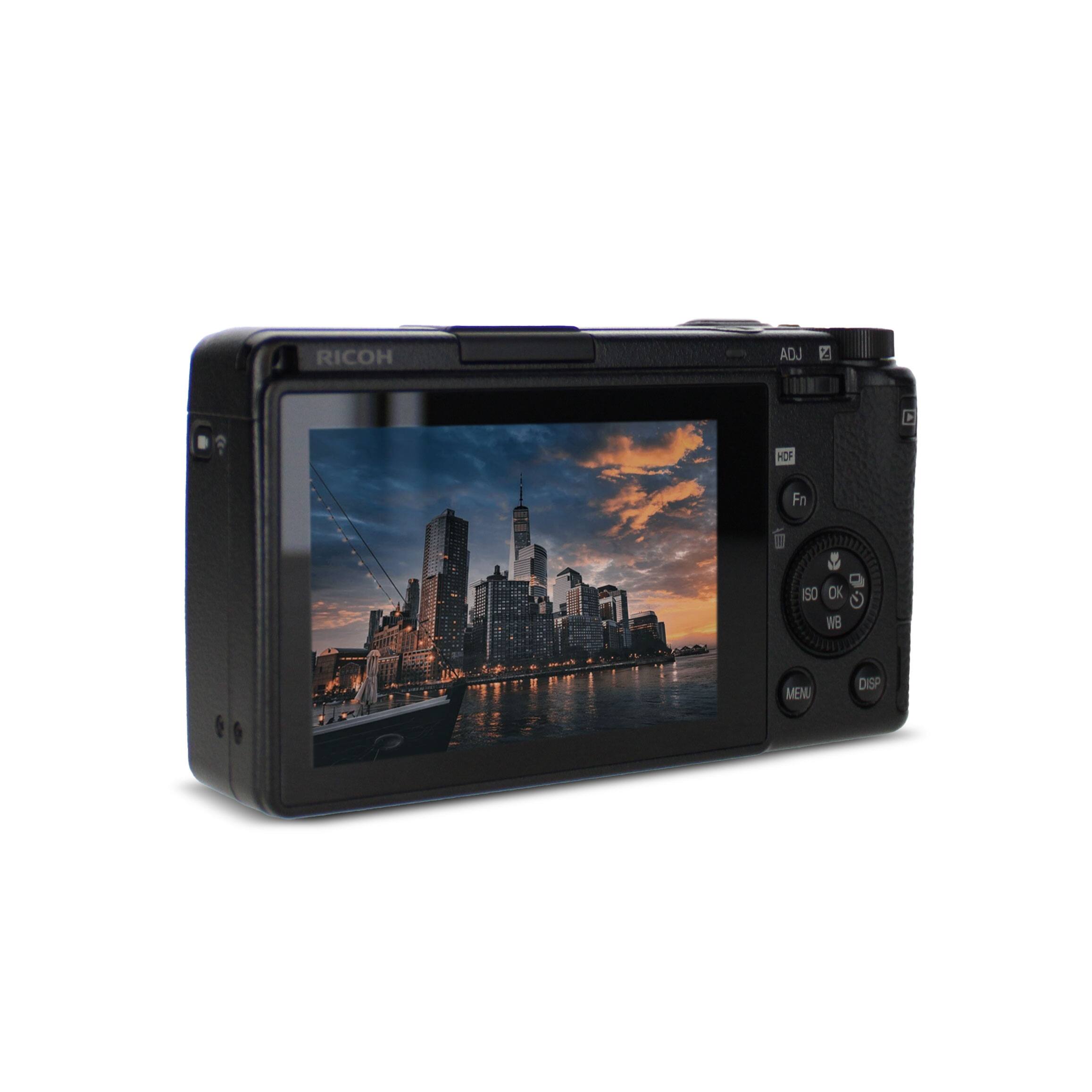 RICOH

ADJ

Fn

ISO

OK

WB

MENU

DISP