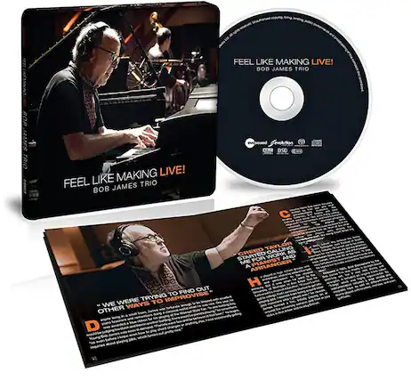 **Front Cover:**
- FEEL LIKE MAKING LIVE!
- BOB JAMES TRIO
**CD:**
- FEEL LIKE MAKING LIVE!
- BOB JAMES TRIO
- Second Evolution
- DSD
- CD
**Back Cover:**
**A**
- "WE WERE TRYING TO FIND OUT OTHER WAYS TO IMPROVISE"
- "We were trying to find out other ways to improvise," says Creed Taylor, who produced the album. "Bob James was playing a classical guitar in Missoula, Montana, and I was in New York. I said, 'Why don't you come to New York and play with me?' So he came, and we started working on this album."
**B**
- "CREED TAYLOR STARTED WORKING AS A PIANO ARRANGER"
- Creed Taylor started working as a piano arranger in the late 1950s, and by the early 1960s, he was a sought-after arranger and producer. He worked with artists like Cannonball Adderley, Wes Montgomery, and Ray Charles.
**C**
- "BOB JAMES WAS PLAYING A CLASSICAL GUITAR IN MISSO