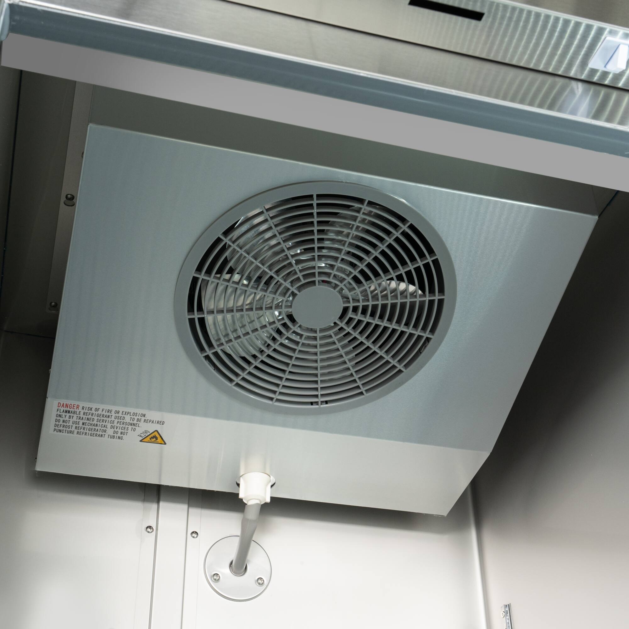 DANGER: Do not remove or tamper with this device. It is a refrigerator temperature control device. Service personnel only. Personal use prohibited. Picture of refrigerator temperature control device.