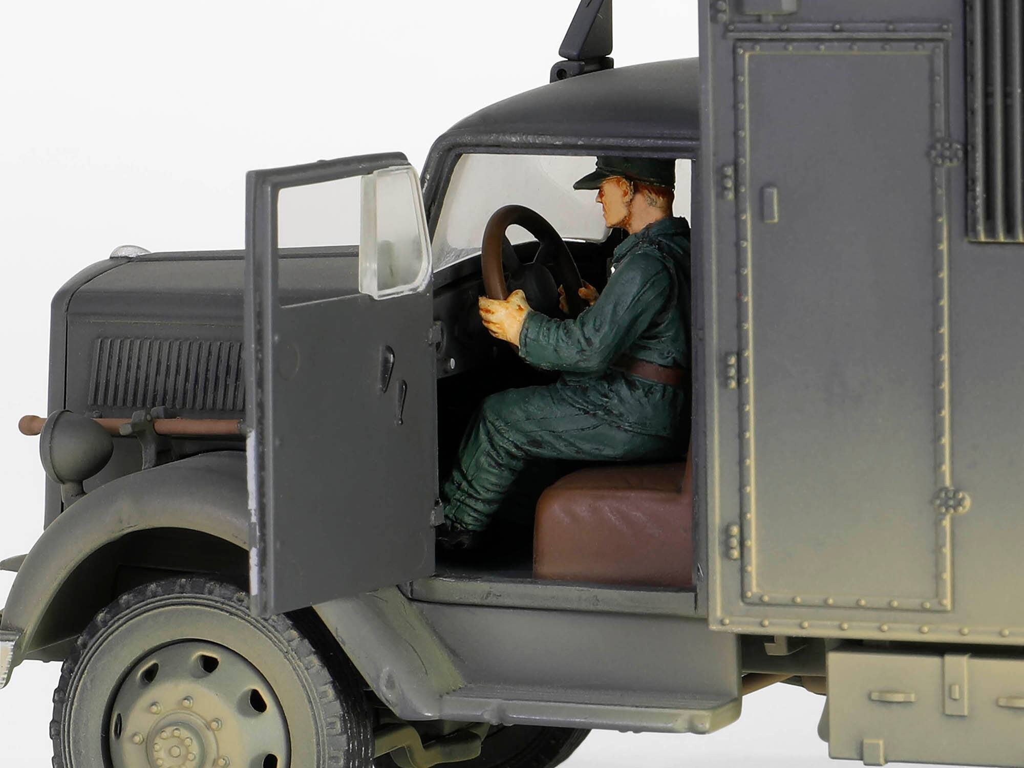 Alt View 7. Forces Of Valor - Opel-Blitz Kfz.305 Ambulance Gray (Weathered) "German Army" "Armoured Fighting Vehicle" 1/32 Model by Forces of Valor.