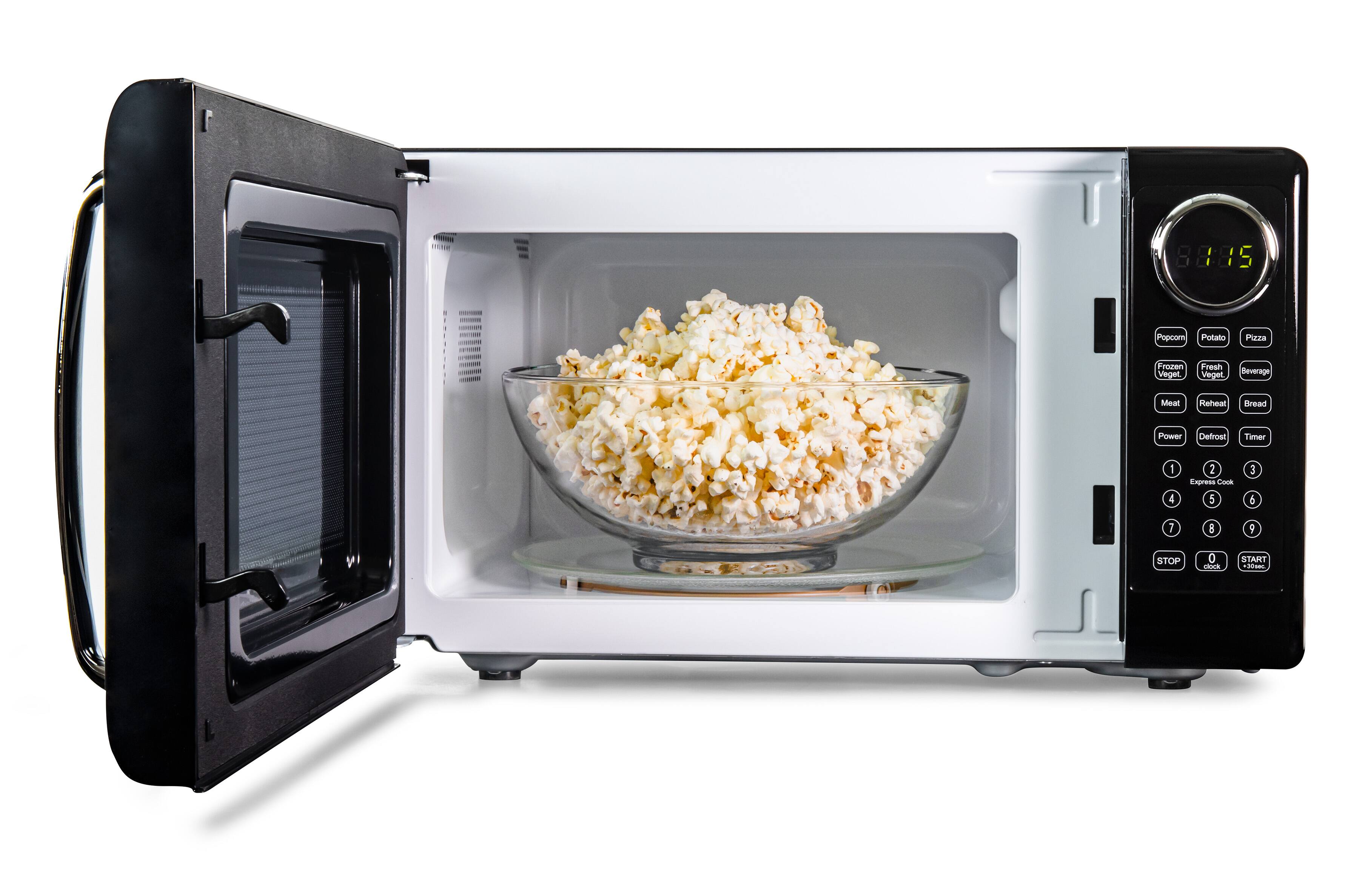 8:85 Popcorn Potato Pizza Frozen Veget Fresh Veget Beverage Meat Reheat Bread Power Defrost Timer 1 2 Express Cook 3 4 5 6 7 8 9 STOP START