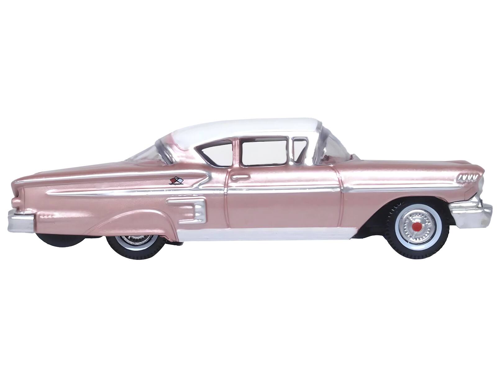 Angle. Oxford Diecast - 1958 Chevrolet Impala Sport Cay Coral Pink Metallic with White Top 1/87 (HO) Scale Diecast Model Car by Oxford Diecast - Coral Pink Metallic With White.