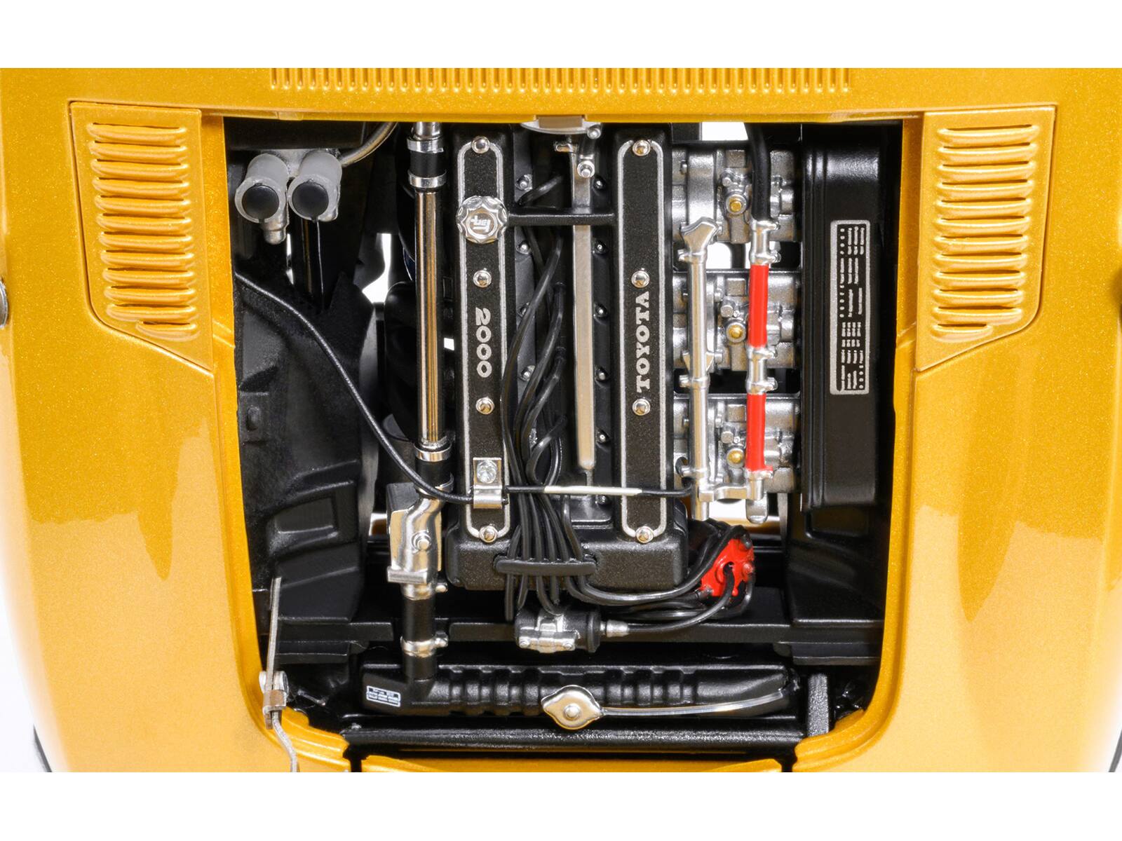 The text on the image reads:

- "TOYOTA"
- "2000"