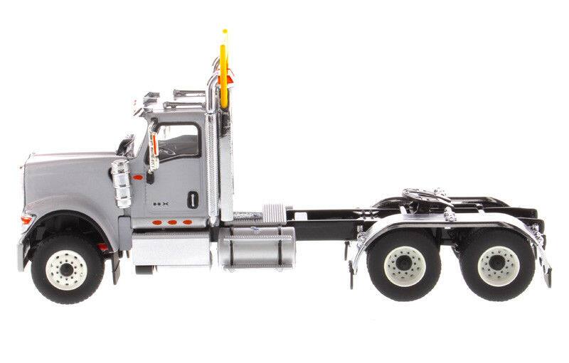 Alt View 2. Diecast Masters - International HX520 Day Cab Tandem Tractor Light Grey 1/50 Diecast Model by Diecast Masters.