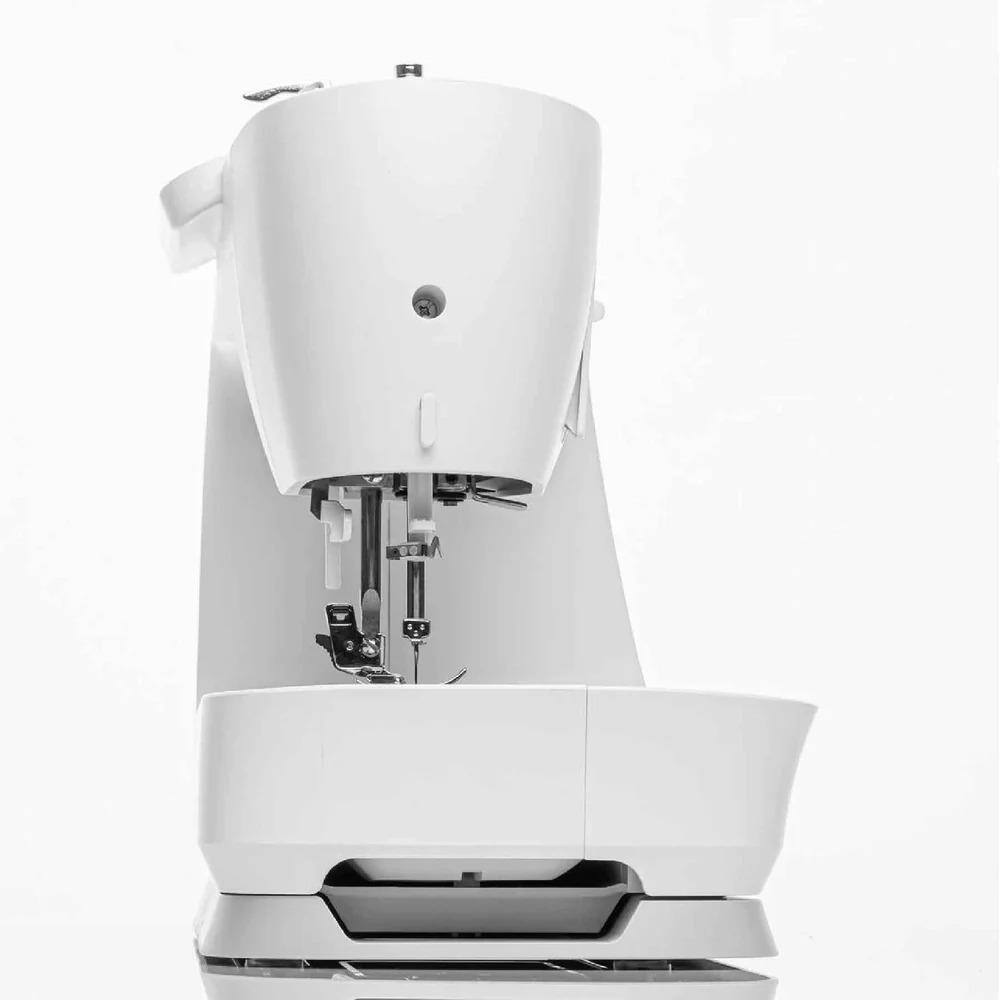 Angle. Singer - Singer C7250 200-Stitch Computerized Sewing Machine with Extension Table.