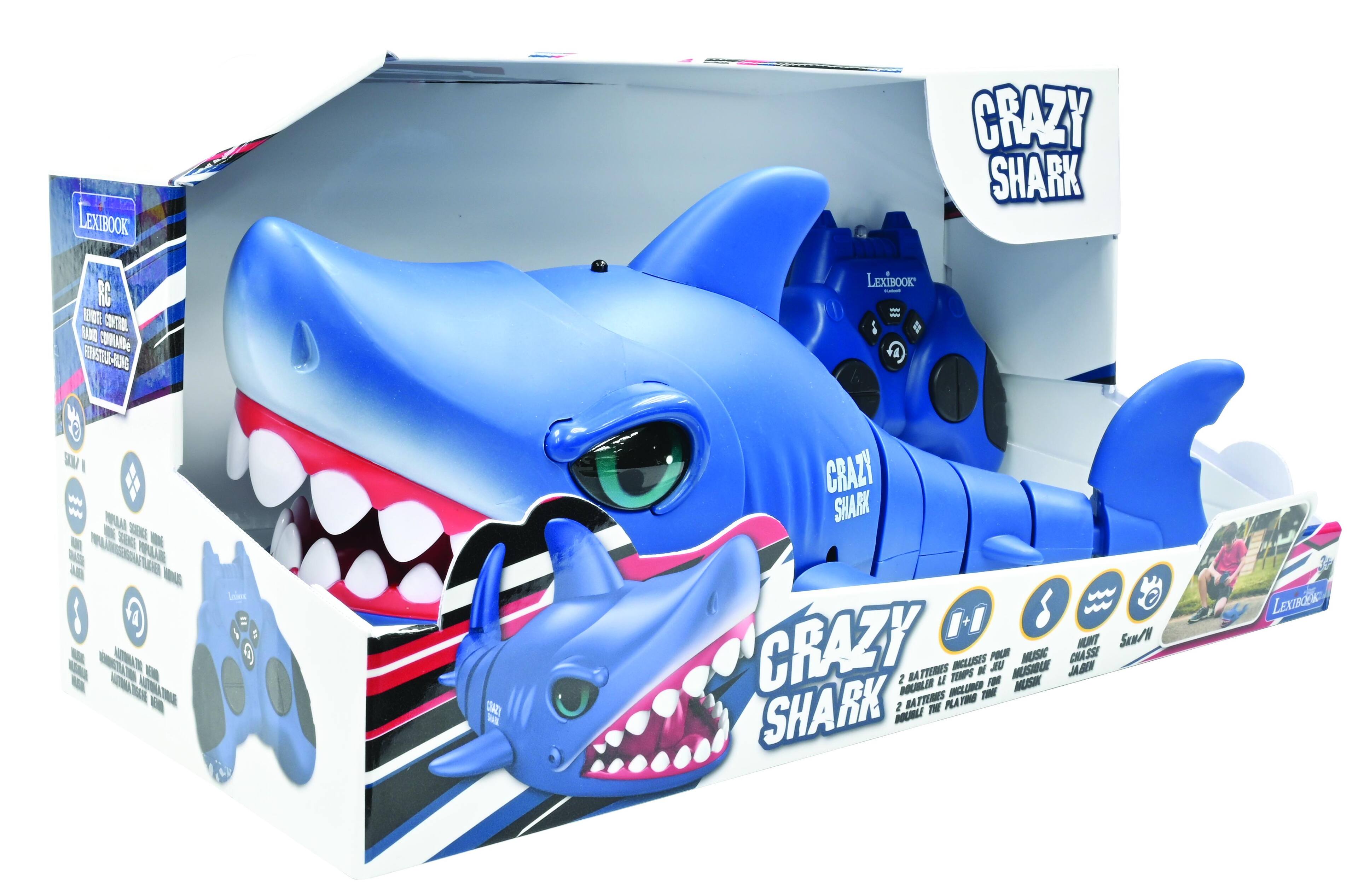 LEXIBOOK CRAZY SHARK N°100

- COOAMe ES- O W I W W - SN U BEN W - WLANAAC MULAR A 1E A M  ALDATE WON  AATE AOIA TILE   OA21 LEXIBOOK i - I 4 CRAZY SHARK HI Sku/W CRAZY MUNT POCE MUSIC CHASSE BCLUSIS M U. MUSIDUE JAB 2 BATTURAS  TOPS FM DOUBLER MCLUM MUSHN BATTERIES - SHARK 2 T PLATING MOUBLI LEXISOH

LEXIBOOK
RC
REMOTE CONTROL
COMMANDE
REMOTE CONTROL
COMANDO
REMOTE CONTROL
COMANDO

CRAZY SHARK

- BATTERIES INCLUDED
- POLAR
- MUSIC
- CHASSE
- SCAN

LEXIBOOK