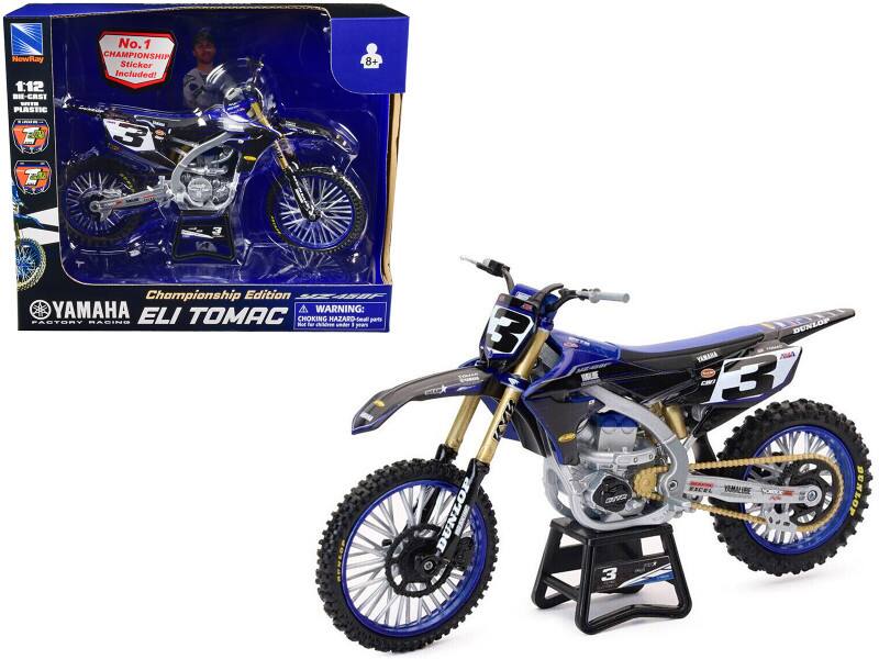 NewRay 1:12 BH-CRST . PLASTIC No.1 1 CHAMPIONSHIP Sticker Included! 3 8+ Championship Edition RAIF YAMAHA A WARNING: PACTORY RAGING ELI TOMAC CHOKING 3 HAZARO-Iea pets - children under 1 poars 3 KAR DUNLOP I SEE aV 3 DUNLOP YAMARA C 3 EICEL TRMALINE MOTHOG