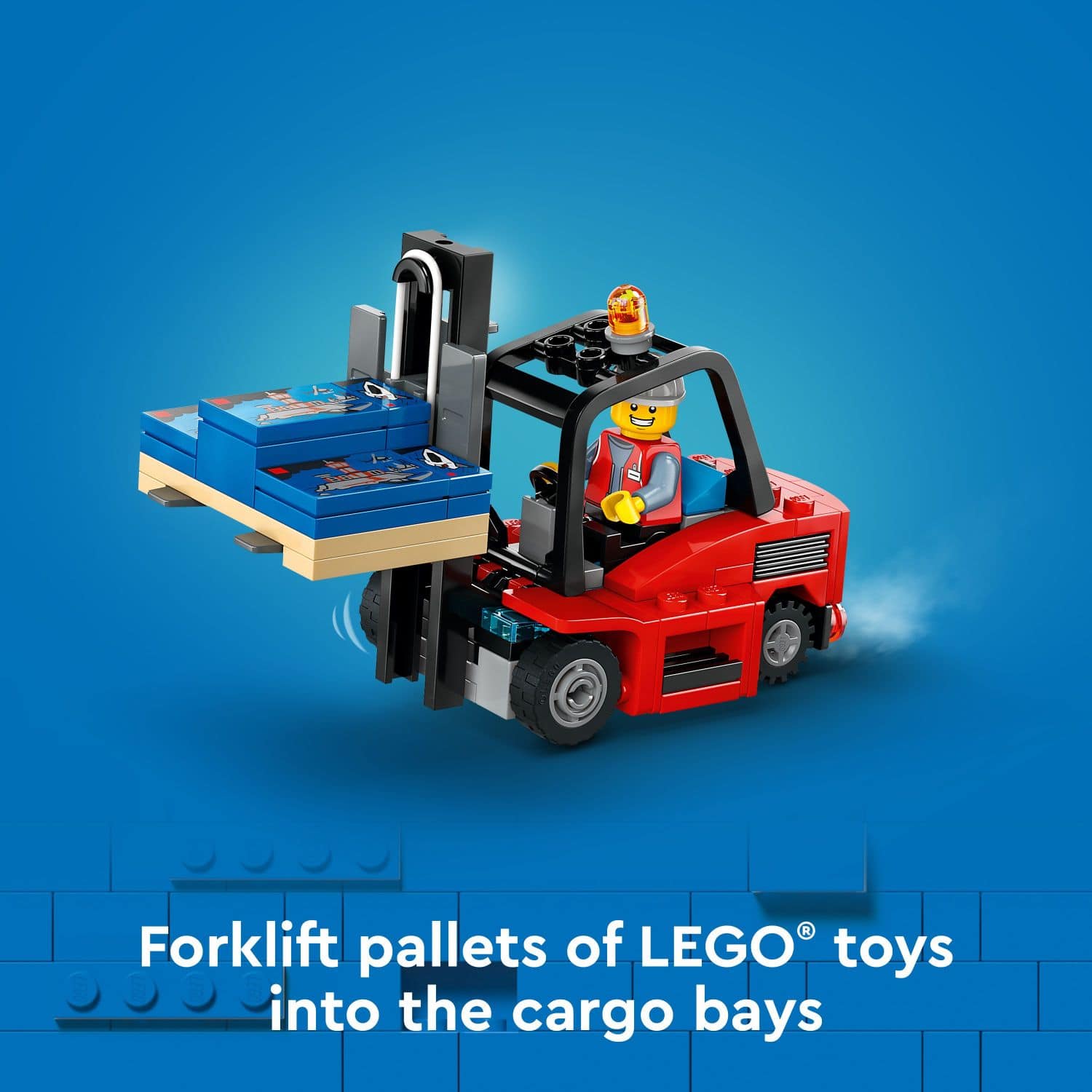 Forklift pallets of LEGO toys into the cargo bays.
