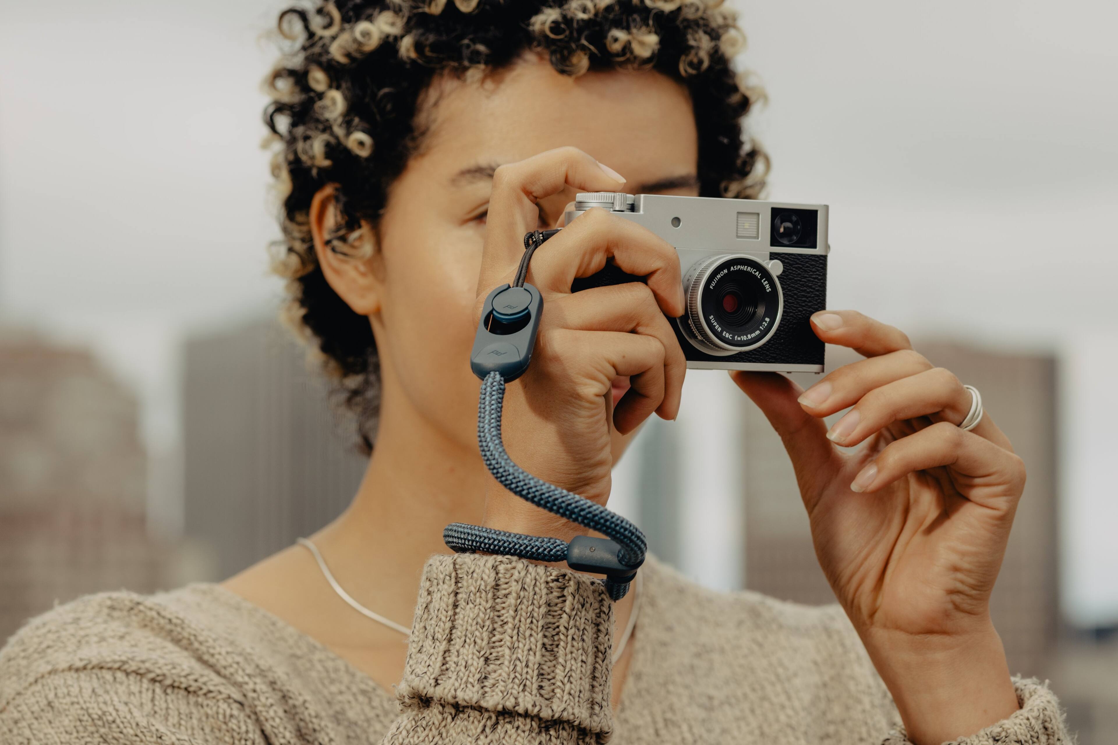 The text on the camera reads: "FUJIFILM ASPHERICAL LENS 40mm f/2.8"