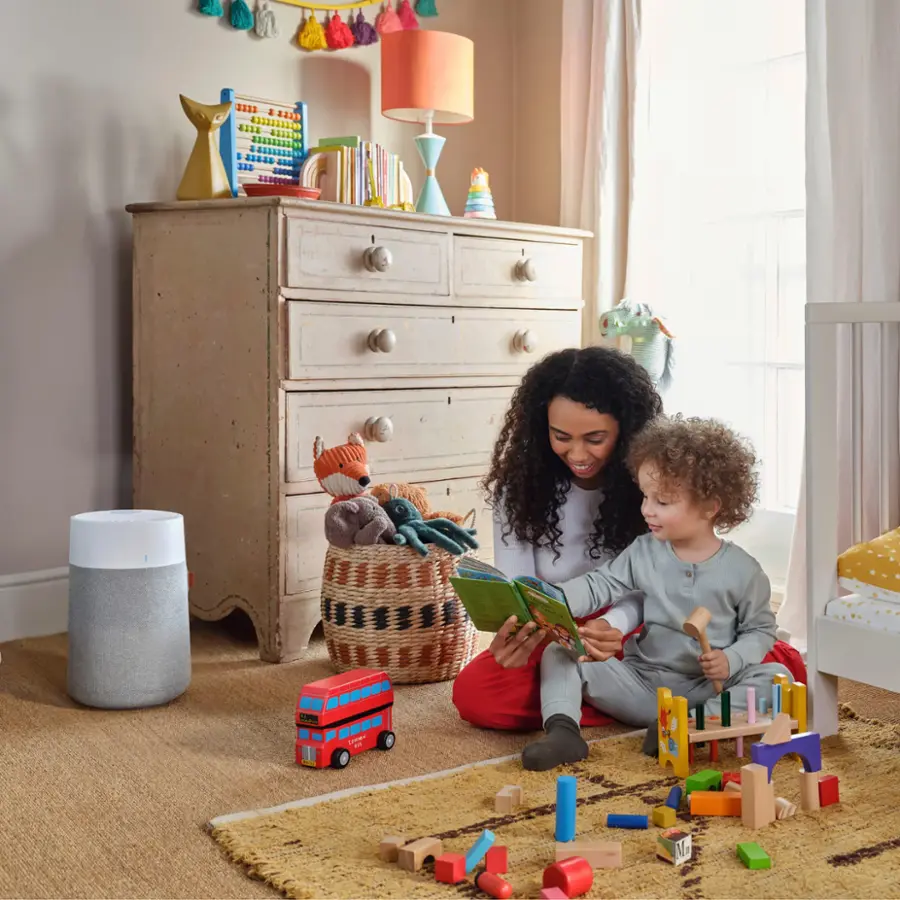 I'm sorry, but the text you provided does not make sense and does not seem to be related to the image. The image shows a woman and a child sitting on a rug, with the woman reading a book to the child. The scene takes place in a room with a bed, a dresser, and a few toys, including a toy bus.