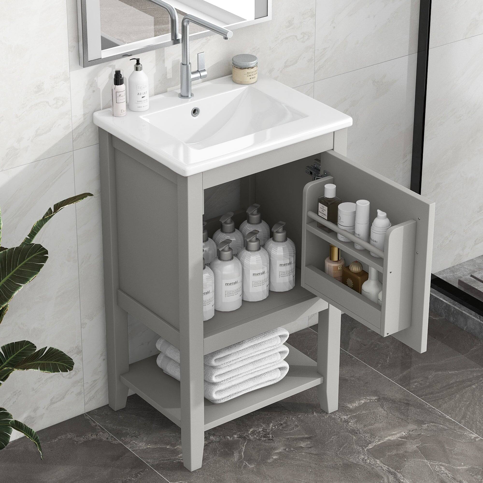 The text on the image reads:

- "meraki" (on the bottles in the cabinet)
- "meraki" (on the bottles on the sink)
- "meraki" (on the bottles in the drawer)
