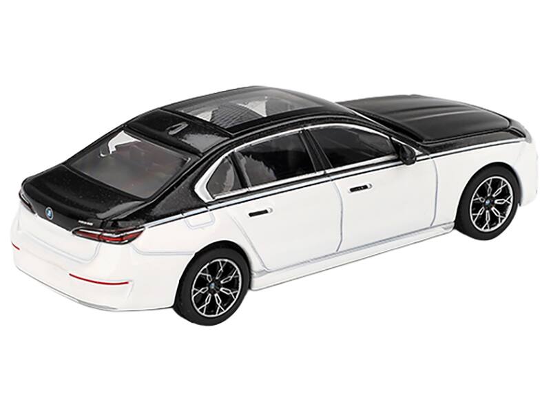 Left. Mini GT - BMW i7 xDrive60 Dravit Alpine White and Black Sapphire Limited Edition 1/64 Diecast Model Car by Mini GT - White And Black.