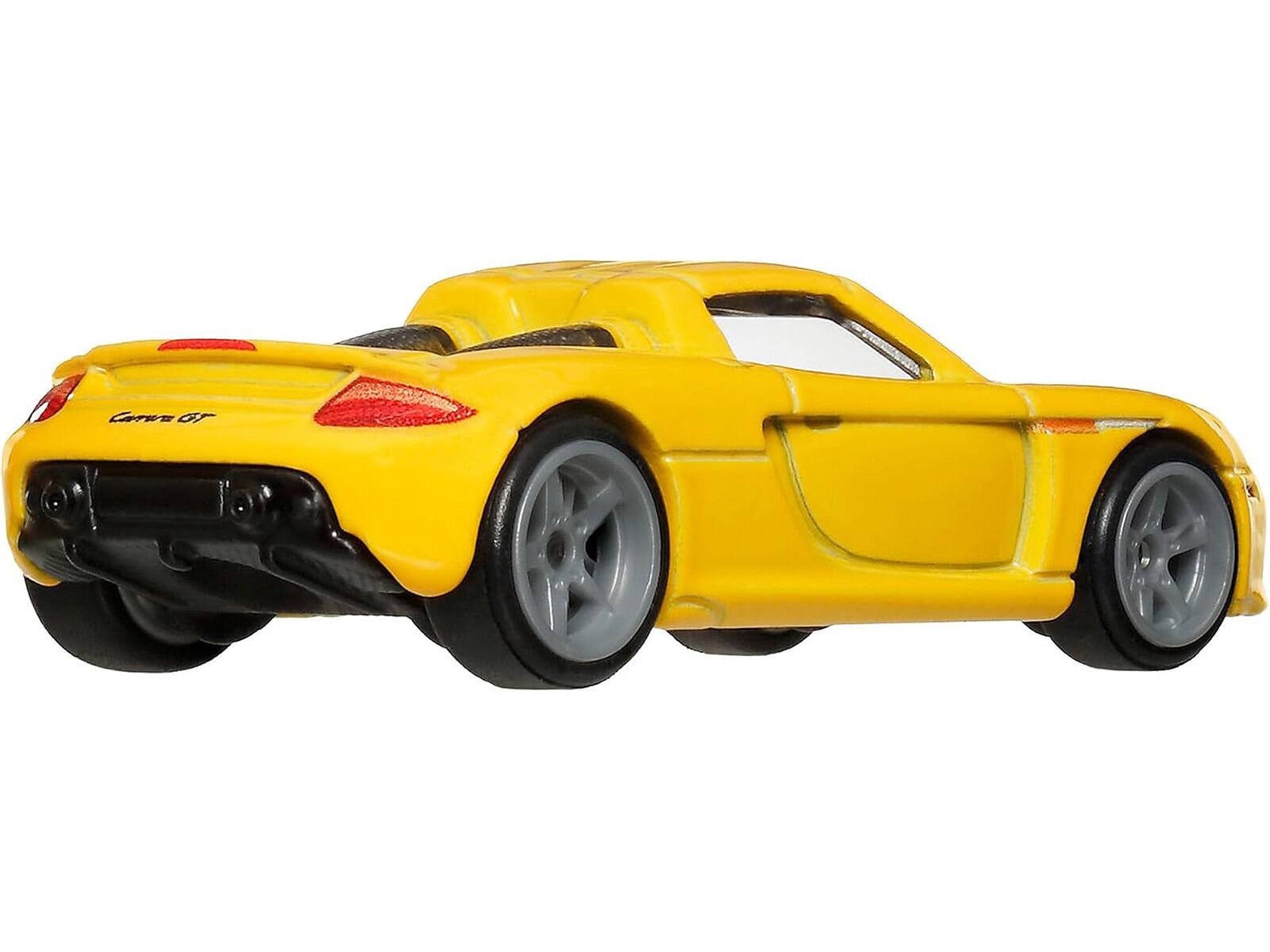 Left. Hot Wheels - Porsche Carrera GT Yellow "Timeless Icons" Series Diecast Model Car by Hot Wheels - Yellow.