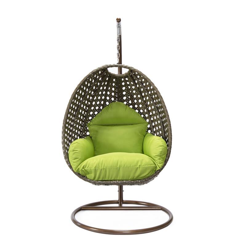 Left. LeisureMod - LeisureMod Beige Wicker Hanging Egg Chair with Iron Stand & Cushion - All-Weather Single Outdoor Patio Swing - Light Green.