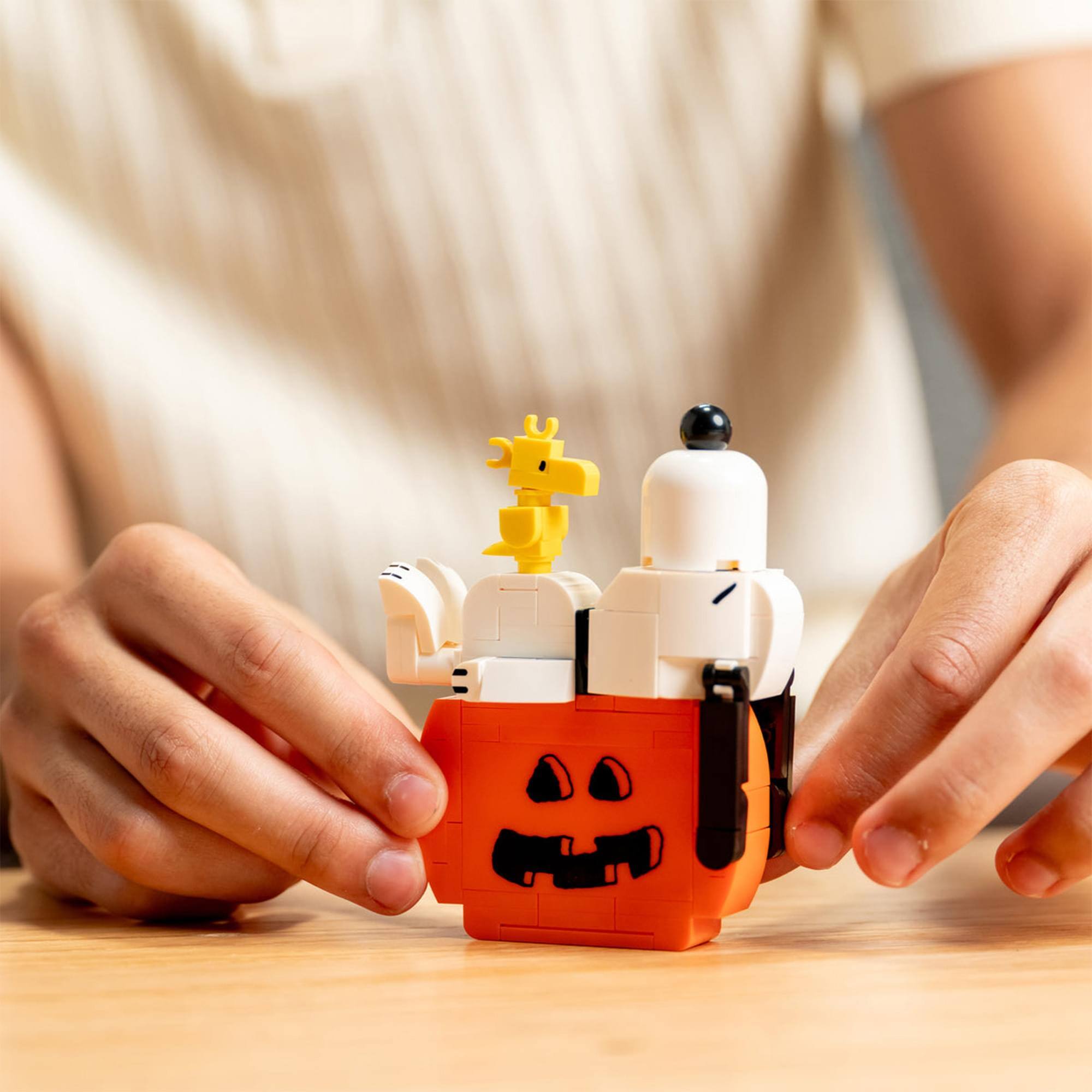 Alt View 3. Brickcraft - Peanuts Snoopy Sleeping On Pumpkin 122-Piece Building Set - Orange.