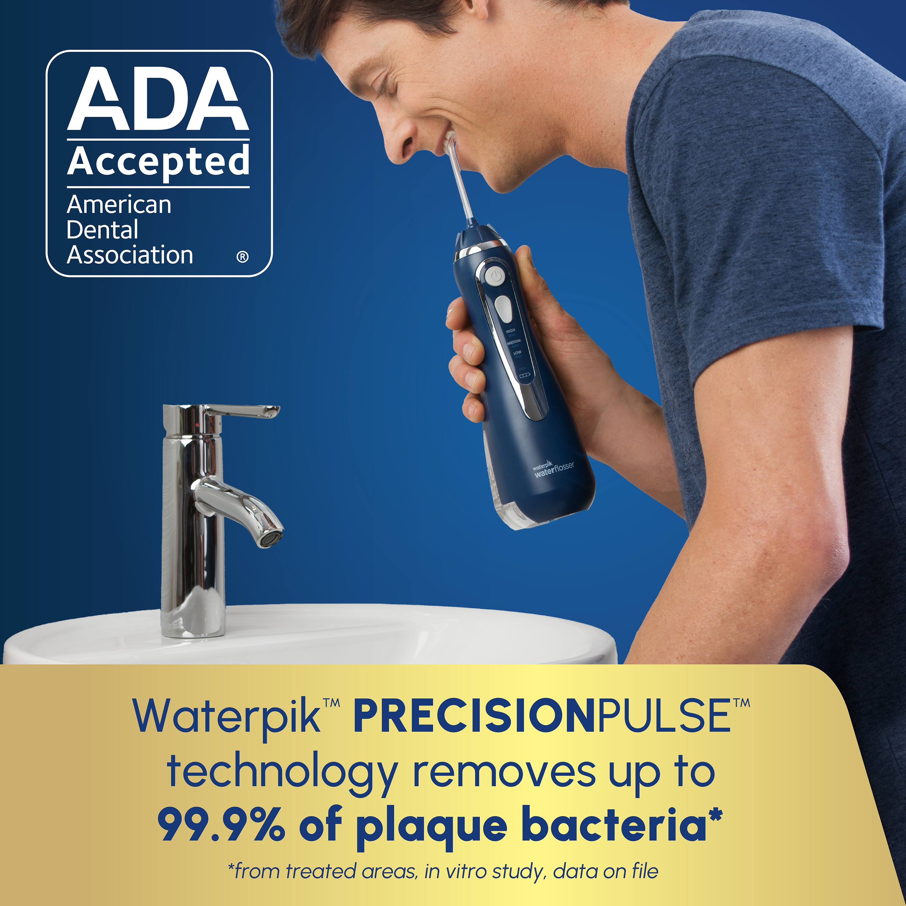 ADA Accepted  
American Dental Association  

F I I V - waterflosser  

Waterpik™ PRECISIONPULSE™ technology removes up to 99.9% of plaque bacteria*  
*from treated areas, in vitro study, data on file