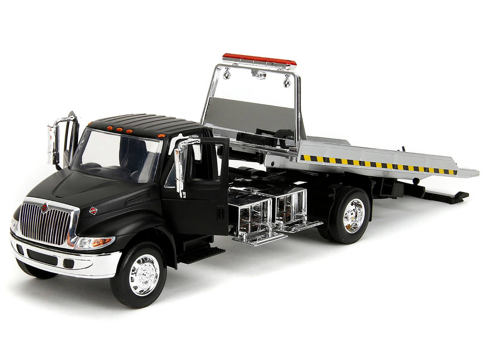 Angle. Jada - International DuraStar 4400 Flatbed Tow Truck Matt Black 1/24 Diecast Model Car by Jada - Matt Black.