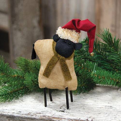 Angle. BreeBe - Stuffed Standing Primitive Sheep in Santa Hat - Multicolor.