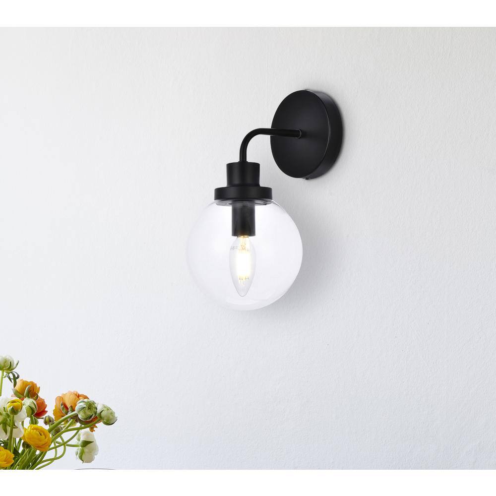 Angle. Living District - Hanson 1 light bath sconce in black with clear shade - Black And Clear Shade.