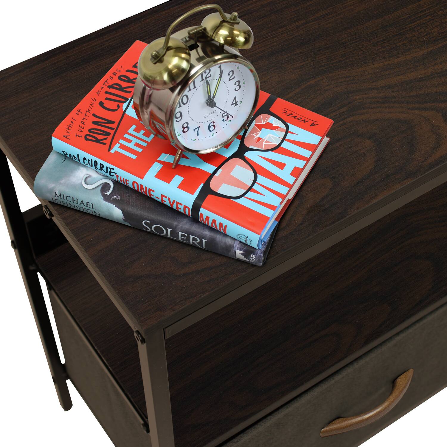 MATTERS!  
12 23 2 11 - 3 EVERYTHING  
CURRI 9 10 SINEUM 5 4 NOvEL 1 - Arthor 8 6 A A RON THE . 7 Ro MICHAEL S CUPRIE THE ONE-EVEN 1 MAN MAN SOLERI F TOR

---

**Corrected Text:**

MATTERS!  
12 23 2 11 - 3 EVERYTHING  
CURRI 9 10 SINEUM 5 4 NOVEL 1 - Author 8 6 A A RON THE . 7 Ro MICHAEL S CUPRIE THE ONE-EVEN 1 MAN MAN SOLERI F TOR

---

**From the Image:**

- **Top Book:**  
  "THE ONE-EVEN MAN"  
  "ROM CURRIE"  
  "Author of EVERYTHING MATTERS!"  
  "MICHAEL JOHNSON"  
  "SOLERI"

- **Alarm Clock:**  
  "QUARTZ"  
  "T2000"