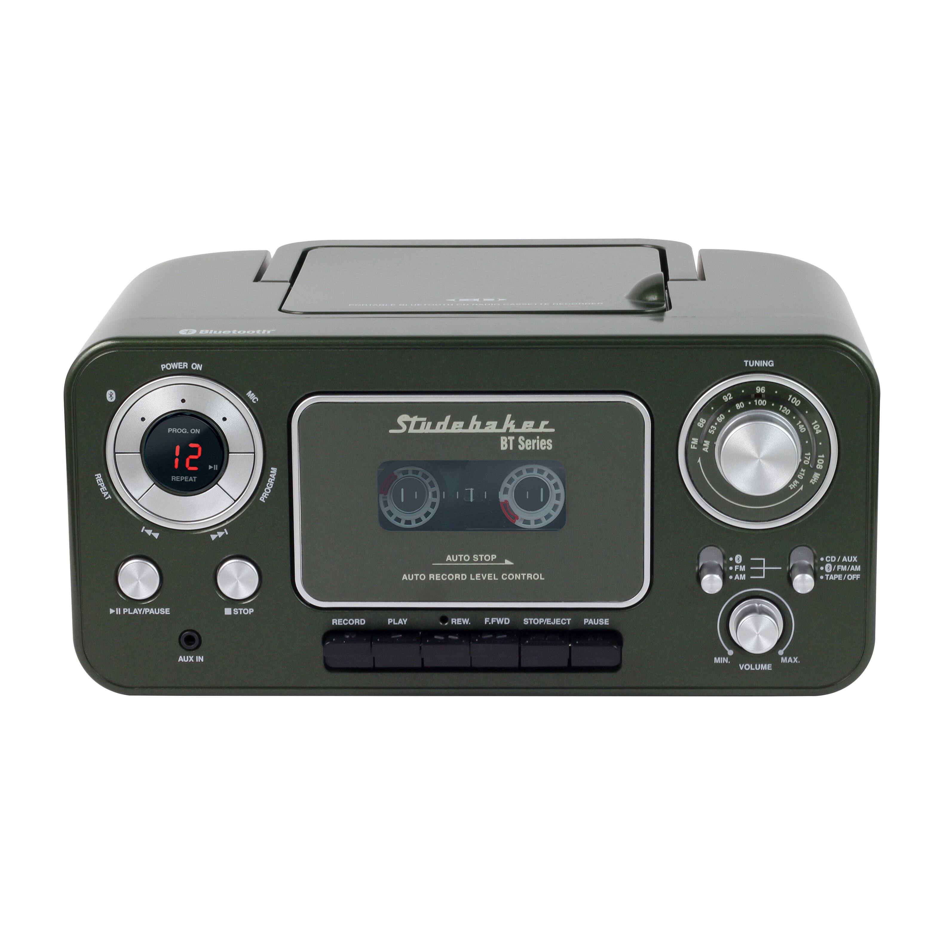 I OTOOTIr POWER ON TUNING 1 REPEAT PROC - 12 + REEAR H D MIC PROGRAM Studehaker BT Series I - - 1 - AUTO STOP AUTO RECORD LEVEL CONTROL H R2 100 100 N0 135 Z g a E 104  AM  106 a  a 0 CO ALA M -E O /M AM TAPE CET .. PLATMPAUSE STOP RECORD PLAY REW FFWD STOREJECT PAUSE ALE a MON MAX VOLUME
