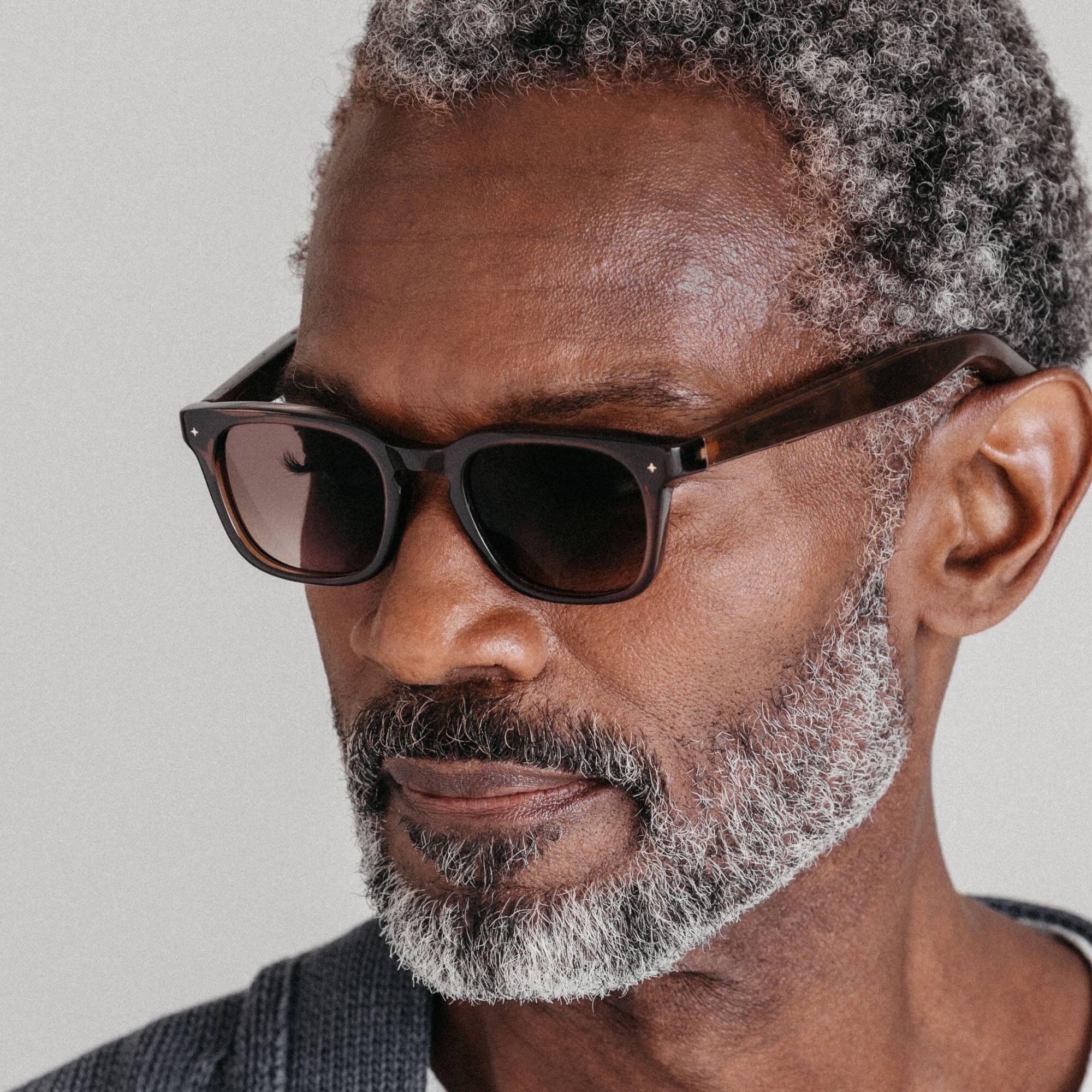 Left. VONDER - OSLO AI Glasses that Translate, Call & Remember, 16h+, Premium Audio, Privacy-First, Clear to Brown Transitions® Lenses - Whiskey.