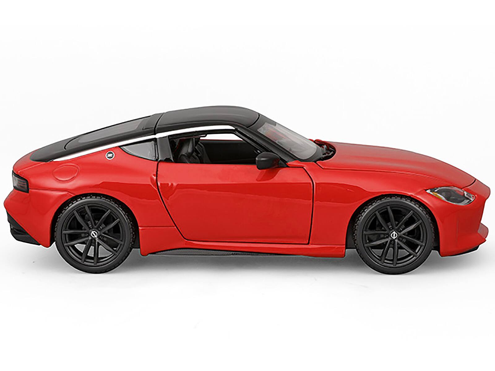 Left. Maisto - 2023 Nissan Z Red with Black Top "Special Edition" Series 1/24 Diecast Model Car by Maisto - Red And Black.