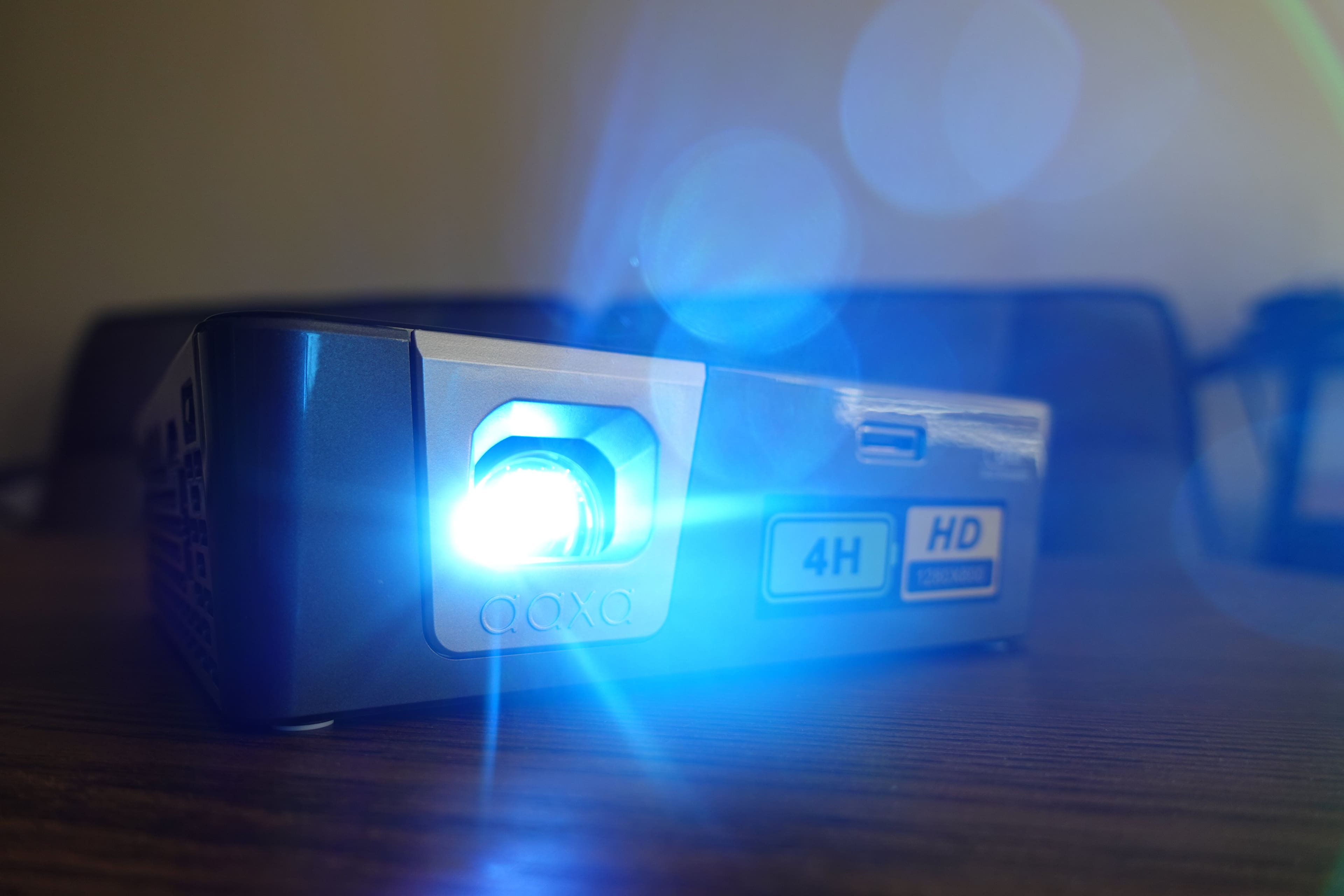 Alt View 12. AAXA - P6X DLP Pico Projector, 4 Hour Battery, USB-C Input, Wireless Mirroring, 1000 Lumens, HDMI/USB/TF Input, 1080p Support - Gray/Black.