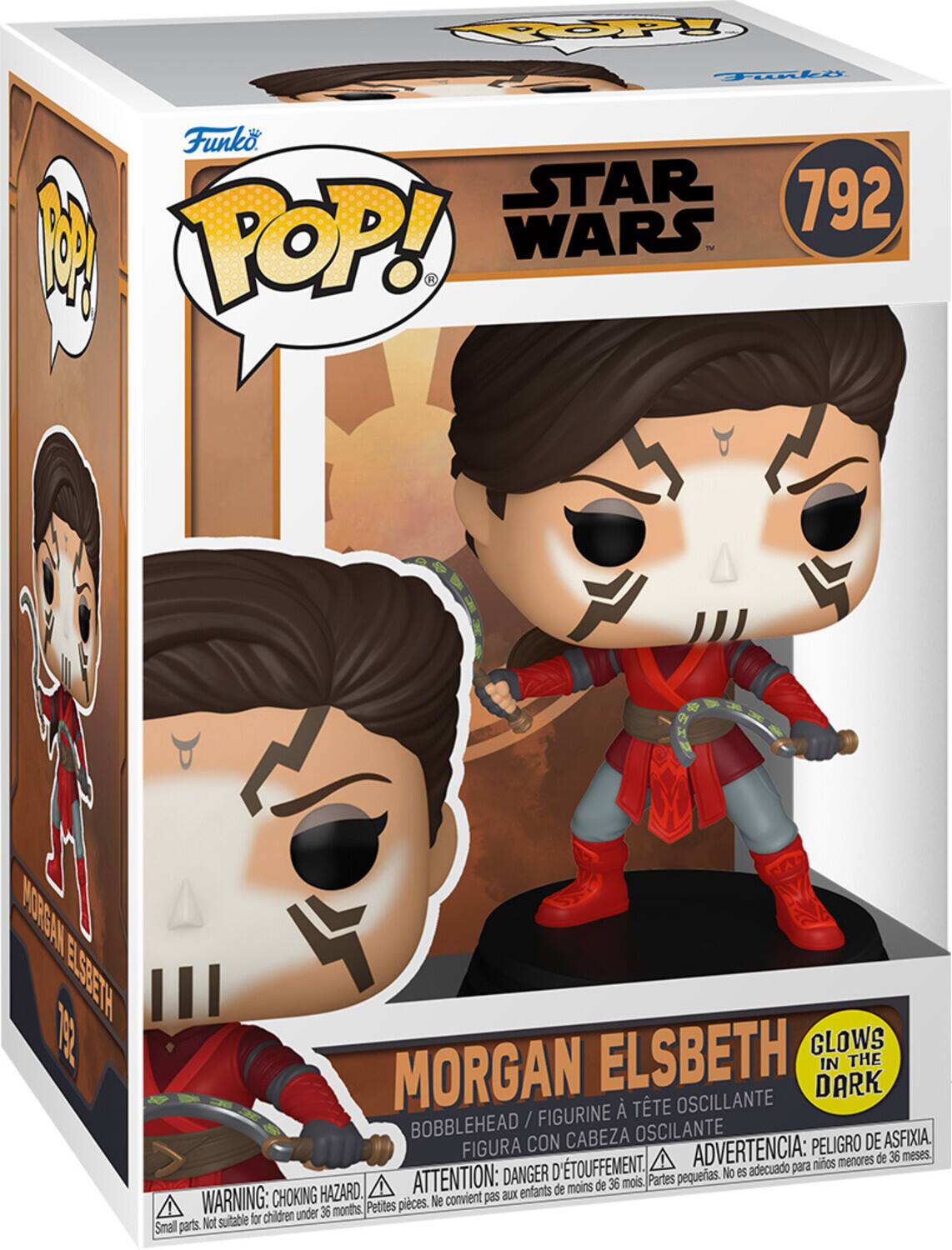 Sure, here is the corrected and grouped text from the image:

---

**Funko POP!**

**STAR WARS**

**792**

**MORGAN ELSBETH**

**BOBBLEHEAD / FIGURINE À TÊTE OSCILLANTE**

**GLOWS IN THE DARK**

**WARNING: CHOKING HAZARD. Small parts. Not suitable for children under 36 months.**

**ATTENTION: DANGER D'ÉTOUFFEMENT. Petites pièces. Ne convient pas aux enfants de moins de 36 mois.**

**ADVERTENCIA: PELIGRO DE ASFIXIA. Partes pequeñas. No es adecuado para niños menores de 36 meses.**

---

This text is organized to reflect the information on the packaging, including the brand, series, character name, features, and safety warnings.